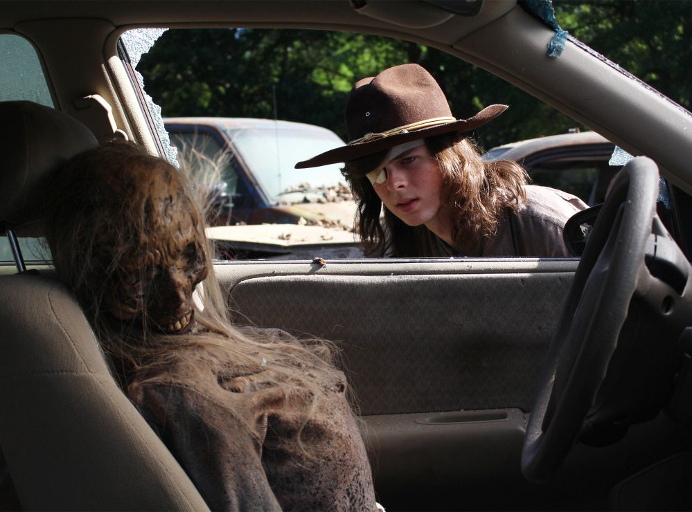 Chandler Riggs as Carl Grimes on Walking Dead, Season 8, Episode 1.