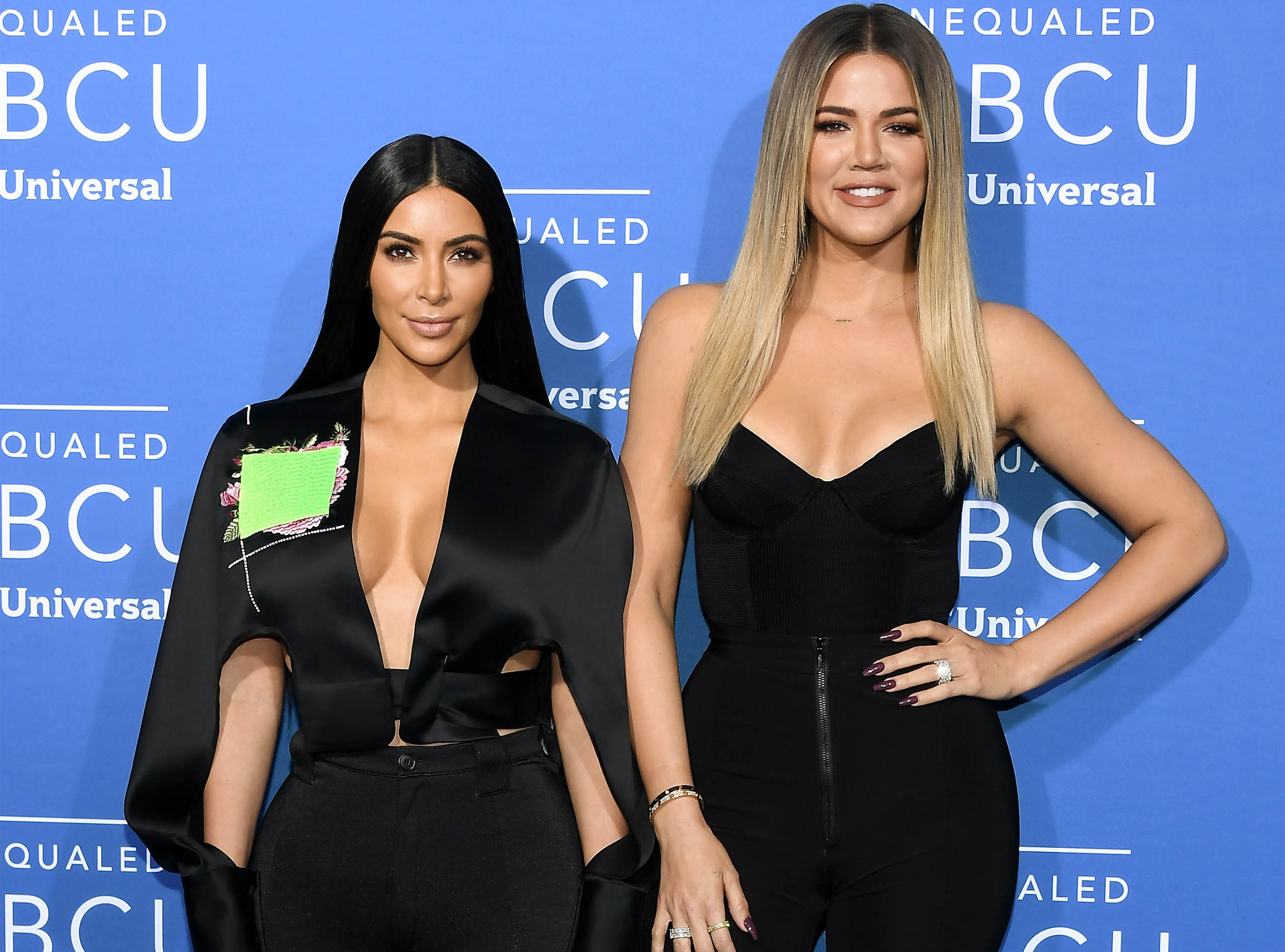 Kim Kardashian West (L) and Khloe Kardashian