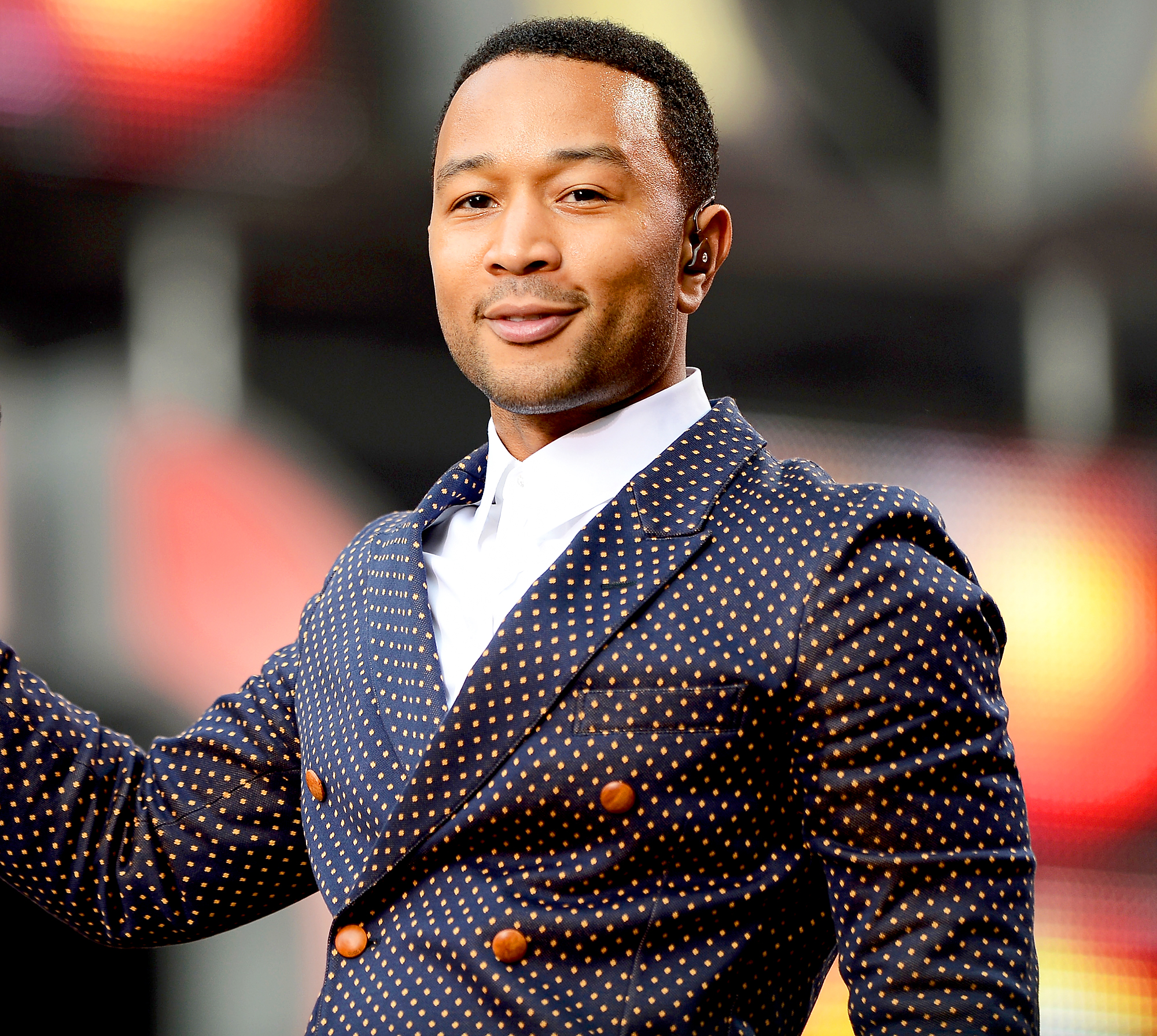 John Legend performs on stage at the "Chime For Change: The Sound Of Change Live" Concert at Twickenham Stadium in London, England.