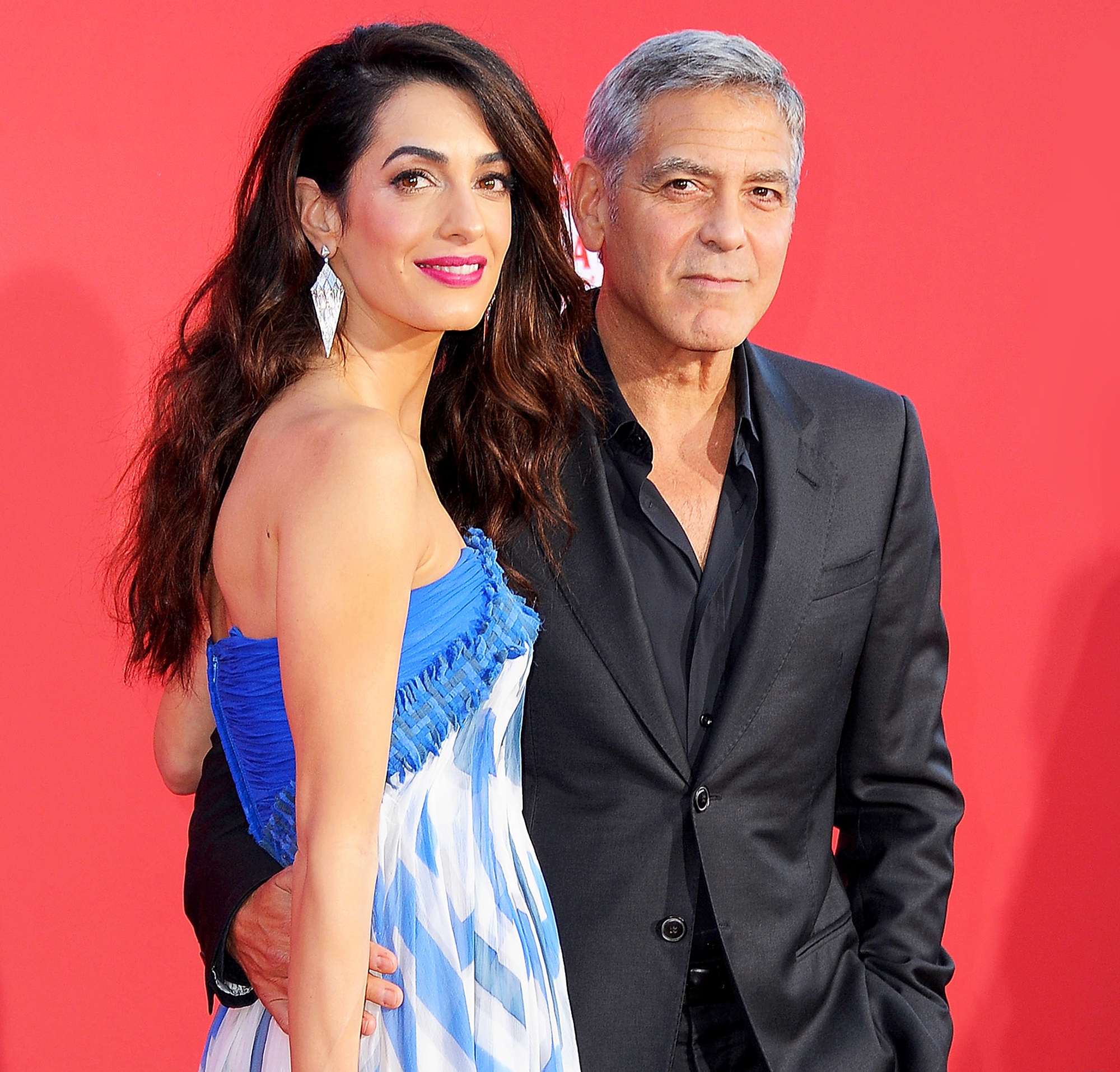 George Clooney and wife Amal arrive at the Los Angeles Premiere "Suburbicon" at Regency Village Theatre on October 22, 2017 in Westwood, California.