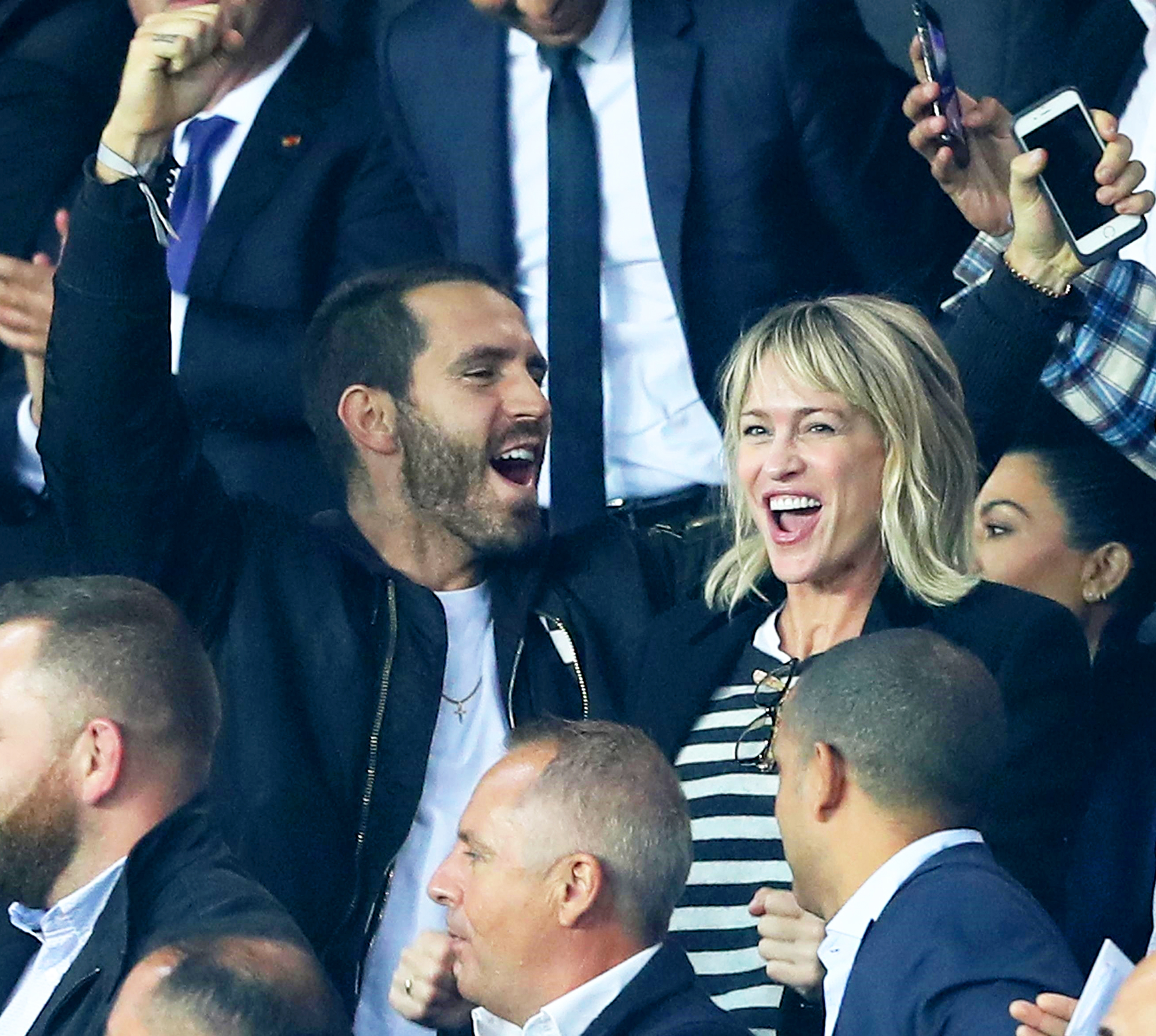 Clement Giraudet and Robin Wright attends the UEFA Champions League group B match at Parc des Princes on September 27, 2017 in Paris, France.