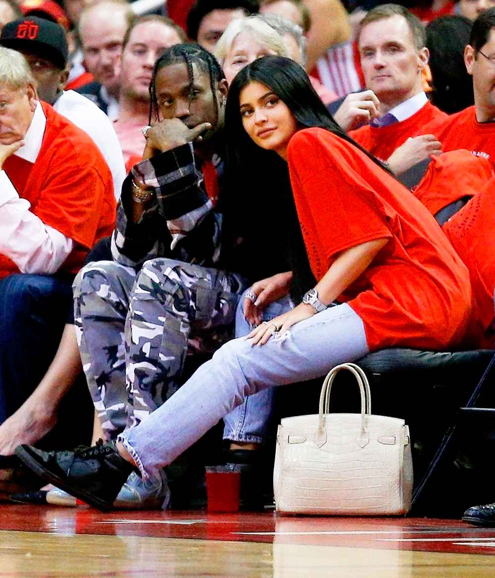 Travis Scott and Kylie Jenner watch court side during Game Five of the Western Conference Quarterfinals game of the 2017 NBA Playoffs at Toyota Center on April 25, 2017 in Houston, Texas.