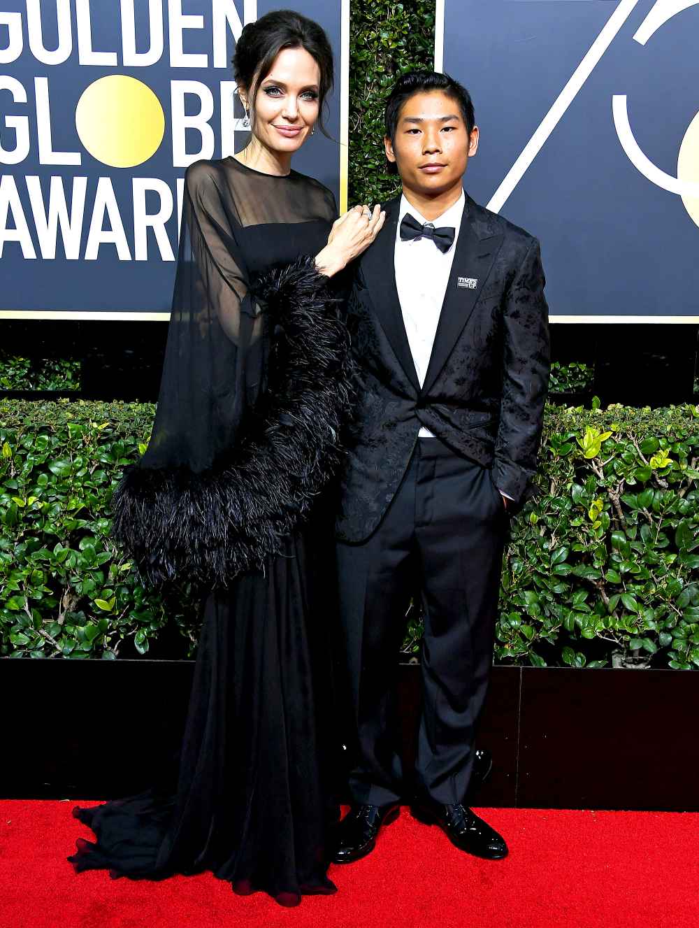 Angelina Jolie and Pax attend The 75th Annual Golden Globe Awards at The Beverly Hilton Hotel on January 7, 2018 in Beverly Hills, California.