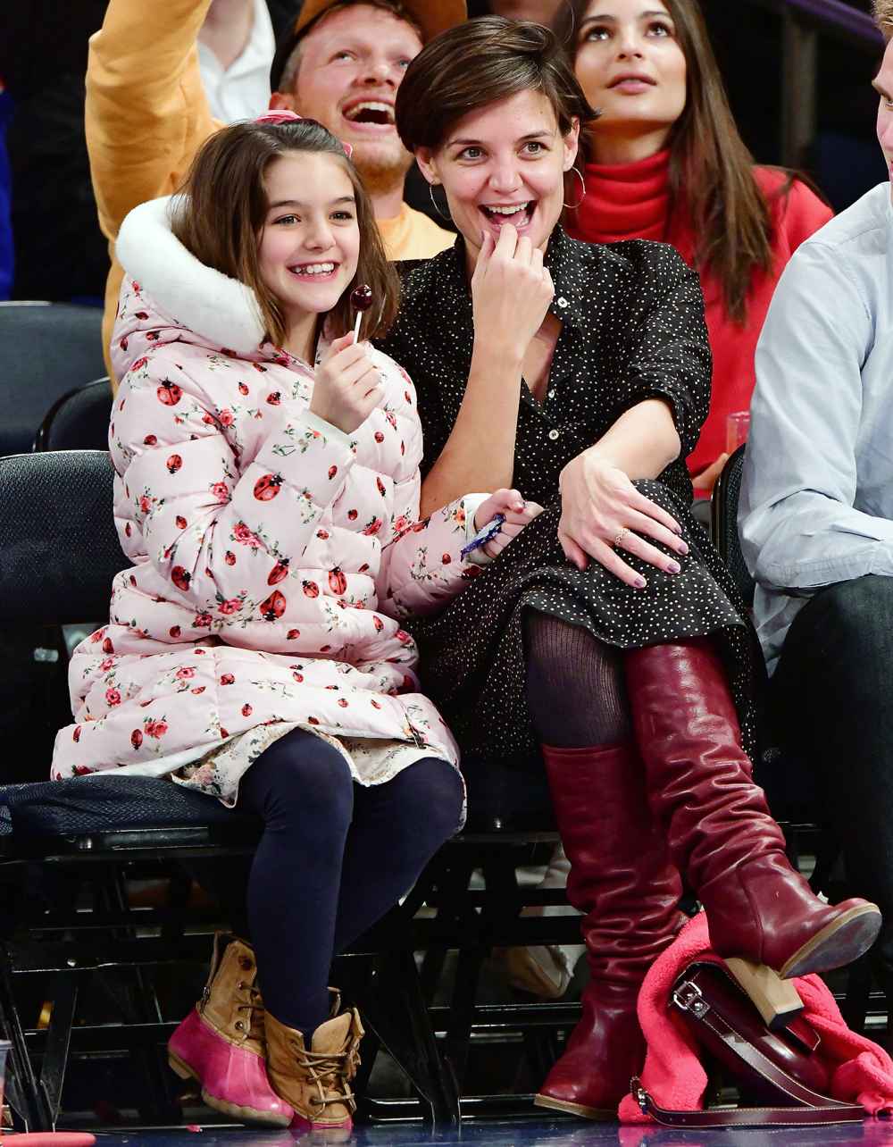 Suri Cruise and Katie Holmes attend the Oklahoma City Thunder Vs New York Knicks game