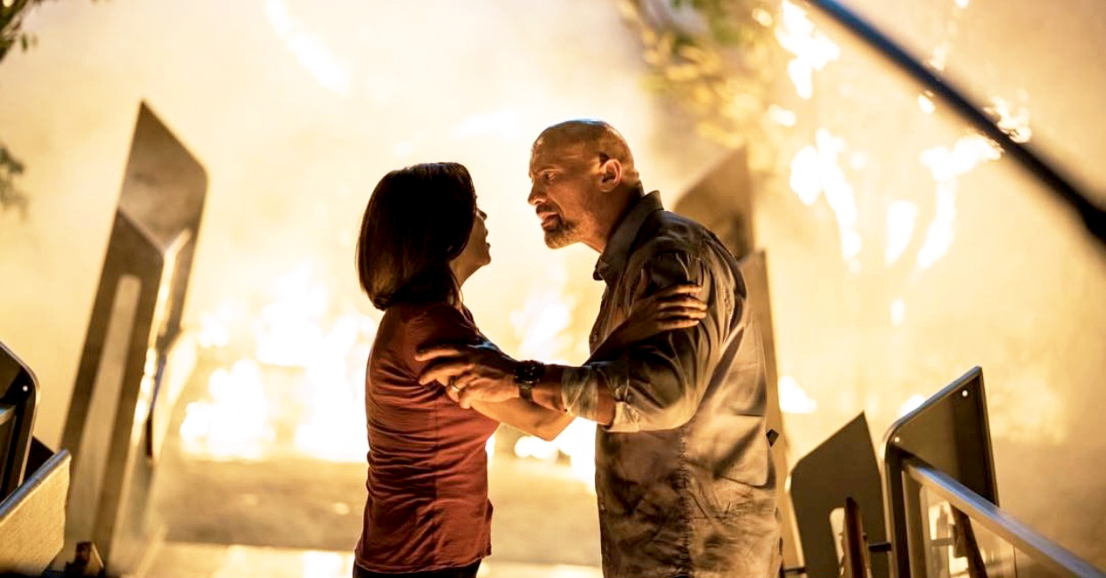 Neve Campbell and Dwayne Johnson in ‘Skyscraper‘
