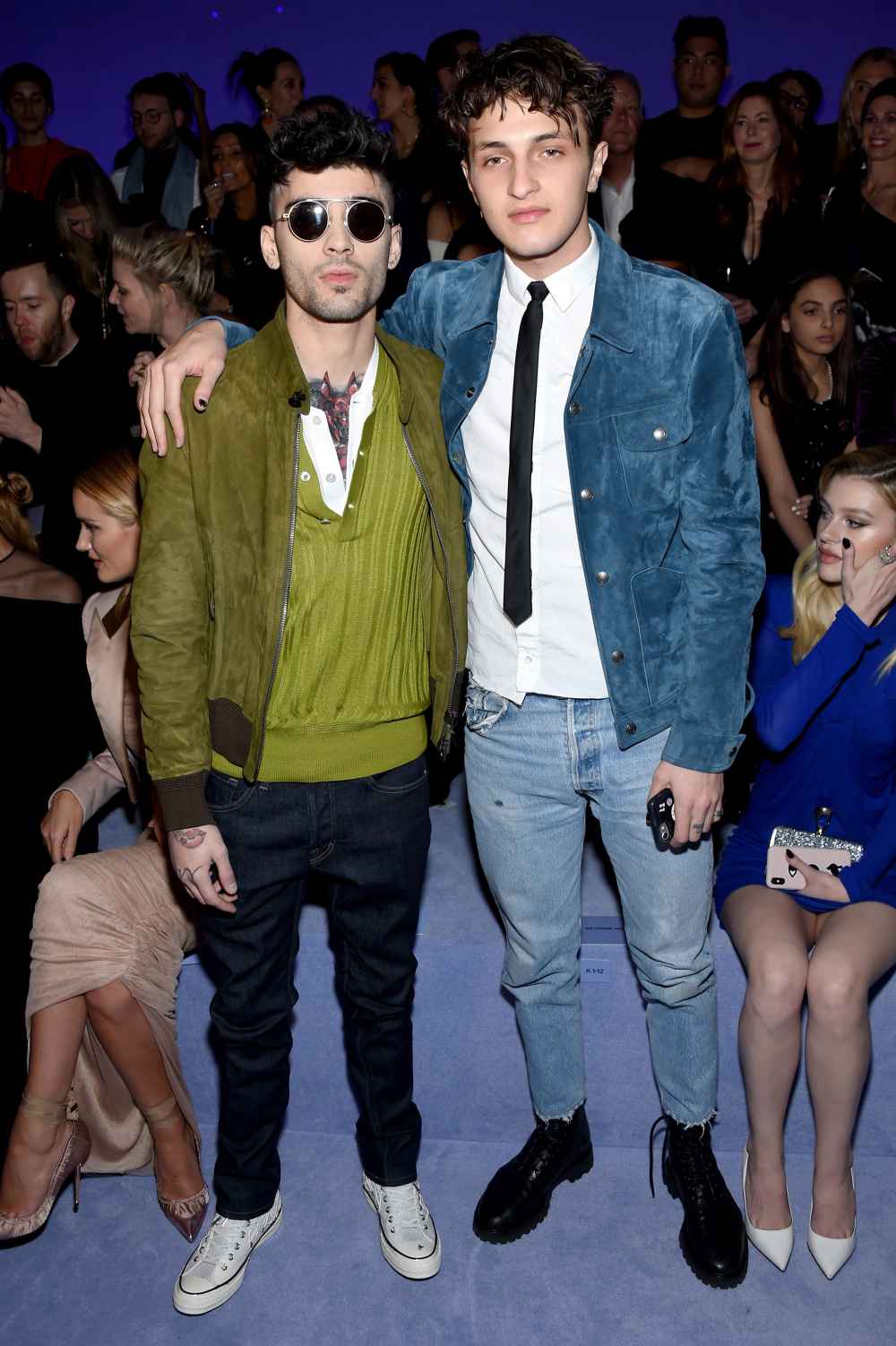 Zayn Malik and Anwar Hadid attend the Tom Ford Fall/Winter 2018 Women's Runway Show