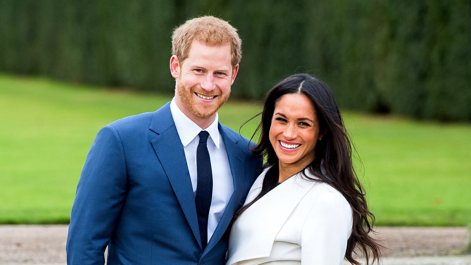 Prince Harry and Meghan Markle during an official photocall to announce their engagement at The Sunken Gardens at Kensington Palace on November 27, 2017 in London, England.