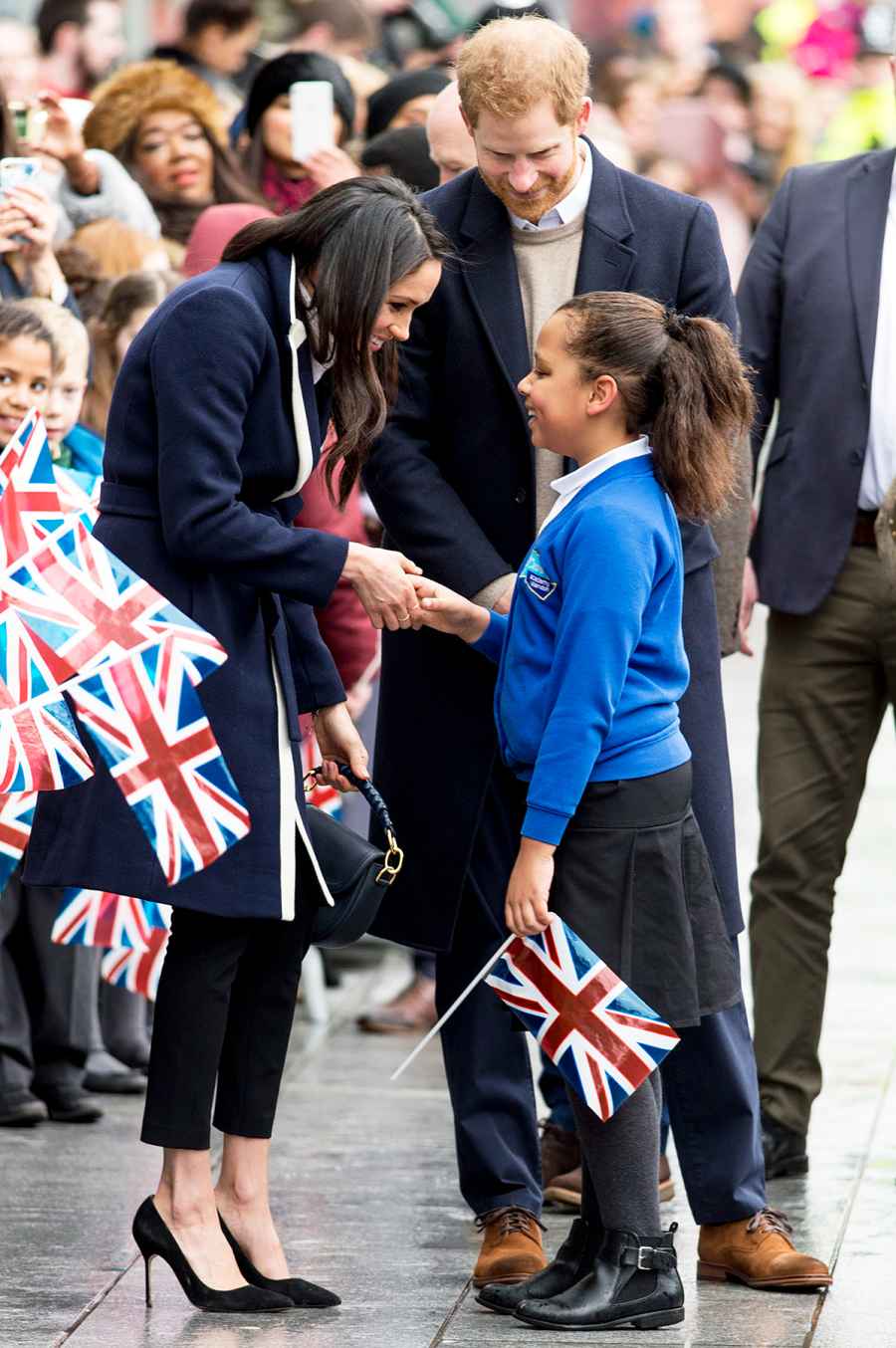 Prince Harry and Meghan Markle Hug Kids at Royal Engagement