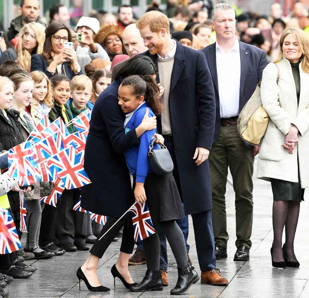 Prince Harry and Meghan Markle Hug Kids at Royal Engagement