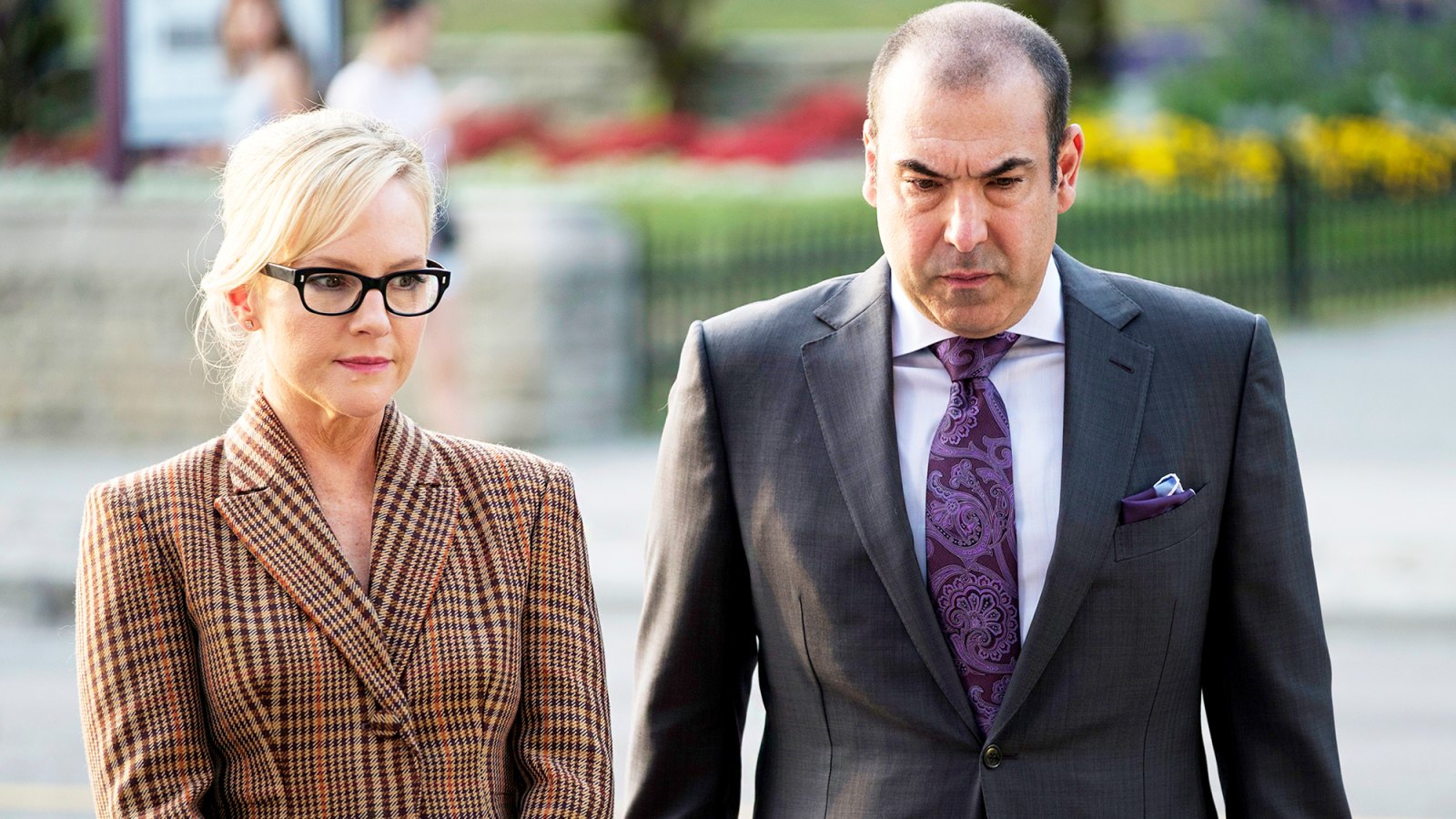 Rachael Harris as Sheila Sazs and Rick Hoffman as Louis Litt in ‘Suits‘