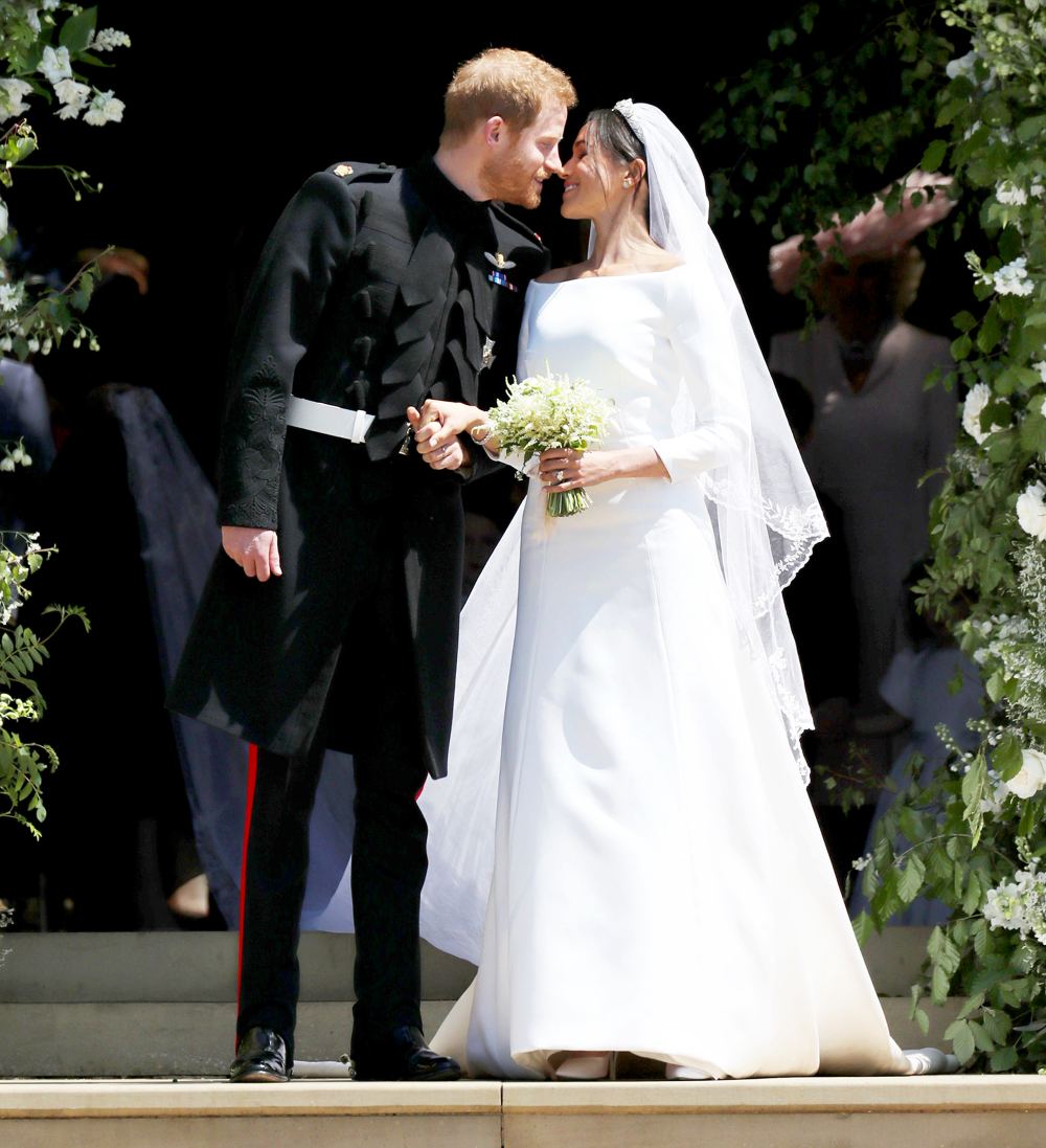 Prince Harry and Meghan Markle leave St George's Chapel after their wedding in St George's Chapel at Windsor Castle on May 19, 2018 in Windsor, England.