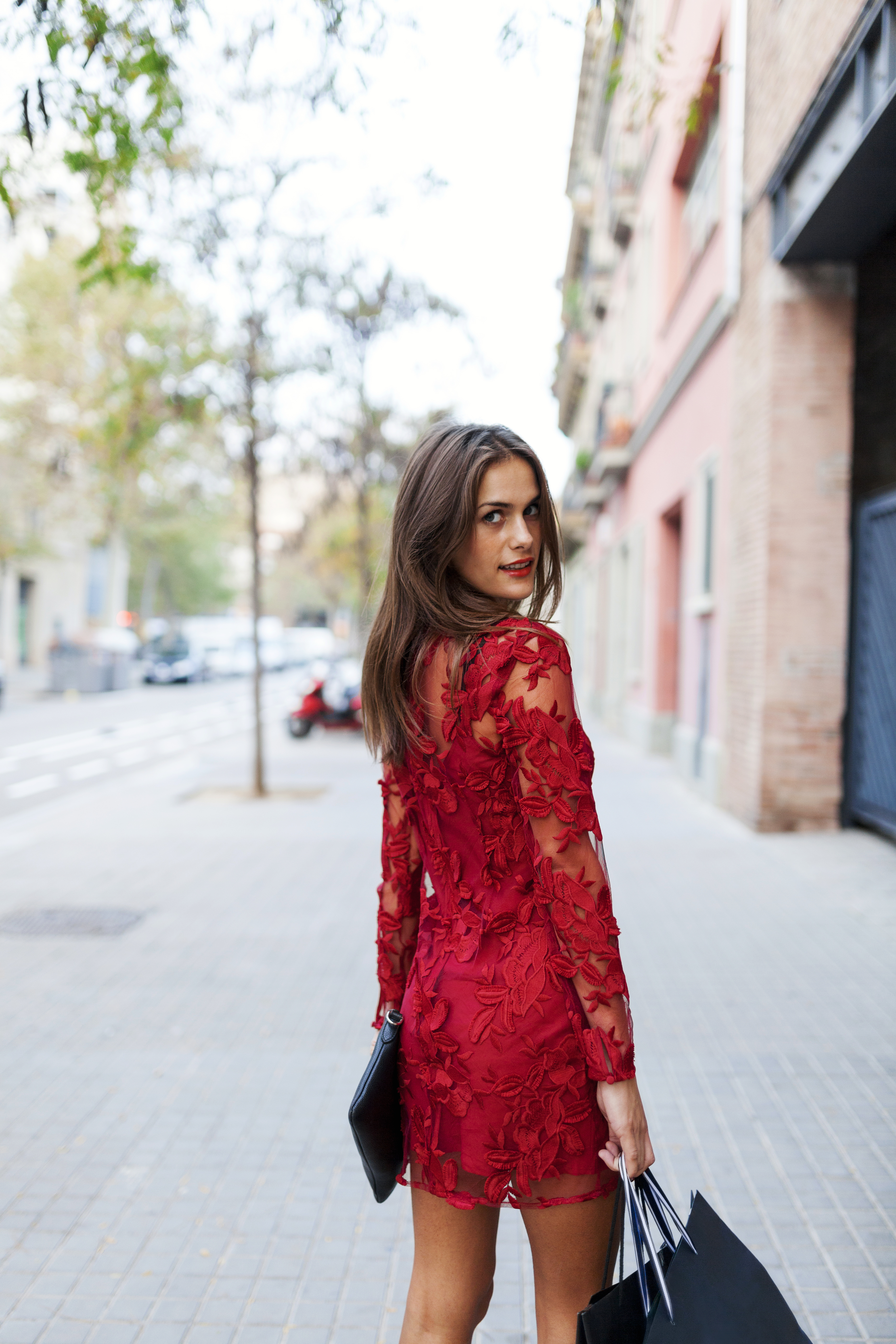 woman in a red dress going on date