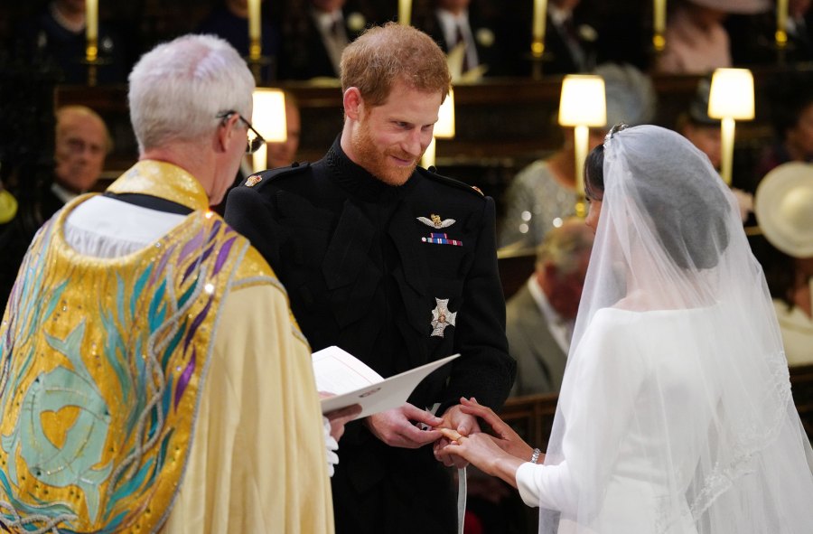 Prince Harry and Meghan Markle exchange rings.