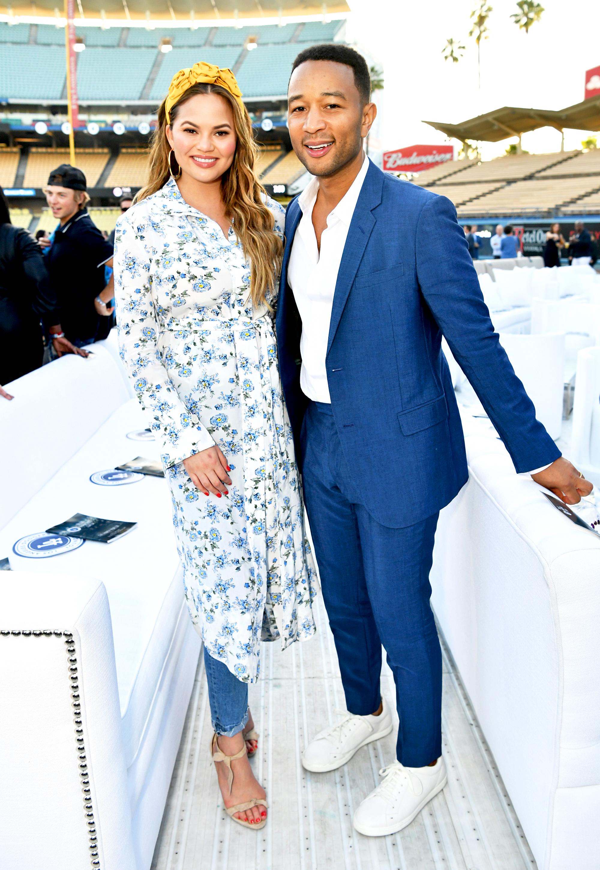 Chrissy Teigen and John Legend attends the Fourth Annual Los Angeles Dodgers Foundation Blue Diamond Gala at Dodger Stadium on June 11, 2018 in Los Angeles, California.