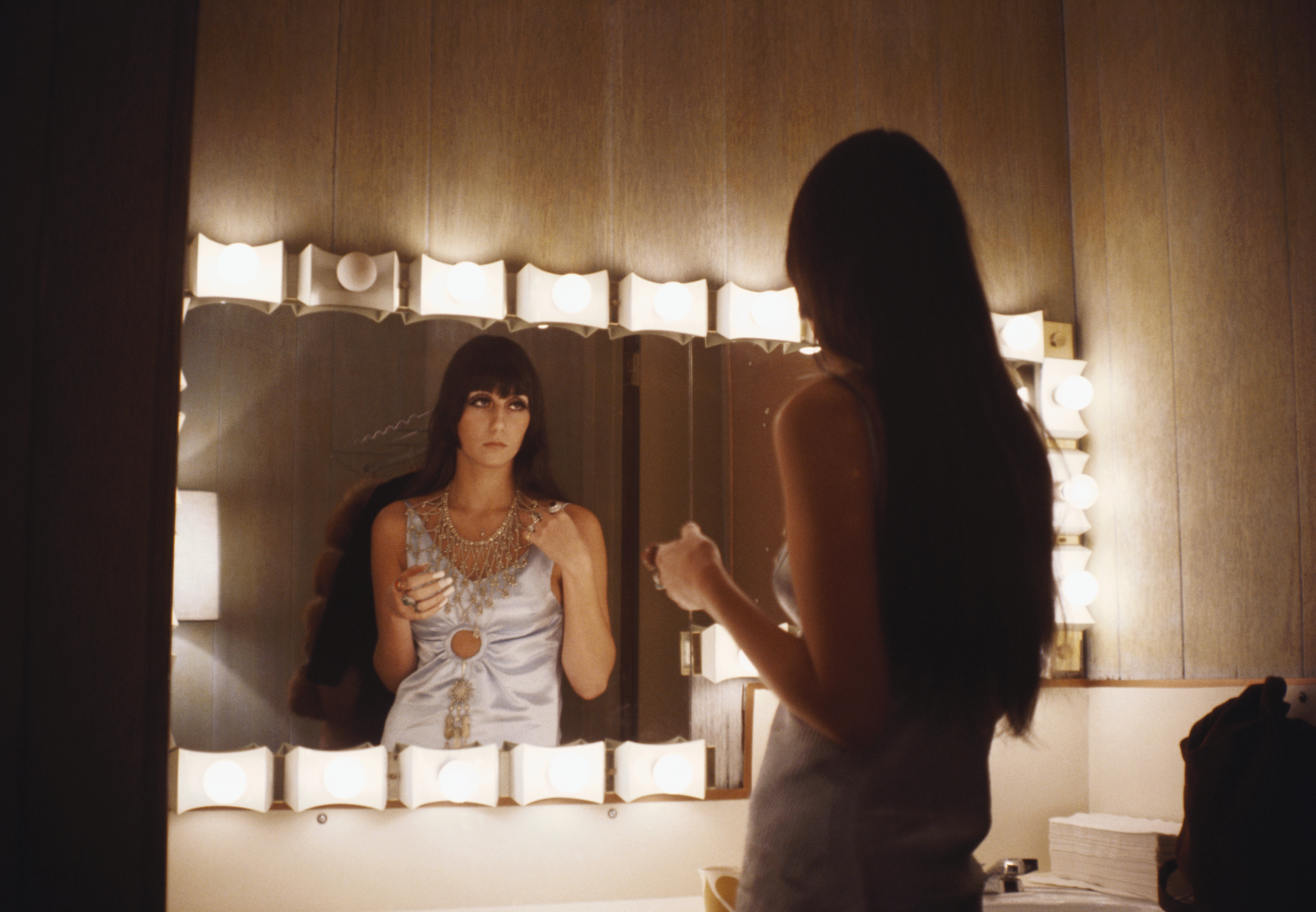 LOS ANGELES - MARCH 1968: Entertainer Cher fixes her make up in a dressing room mirror in March 1968 in Los Angeles, California. (Photo by Michael Ochs Archives/Getty Images)