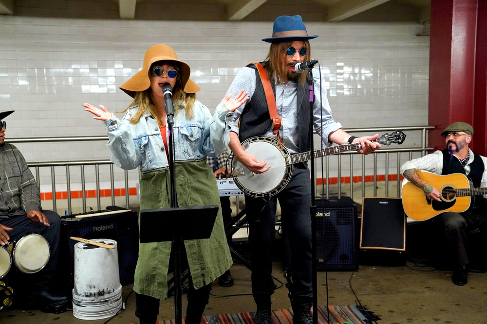 Christina Aguilera with Host Jimmy Fallon during a "Subway Busking"