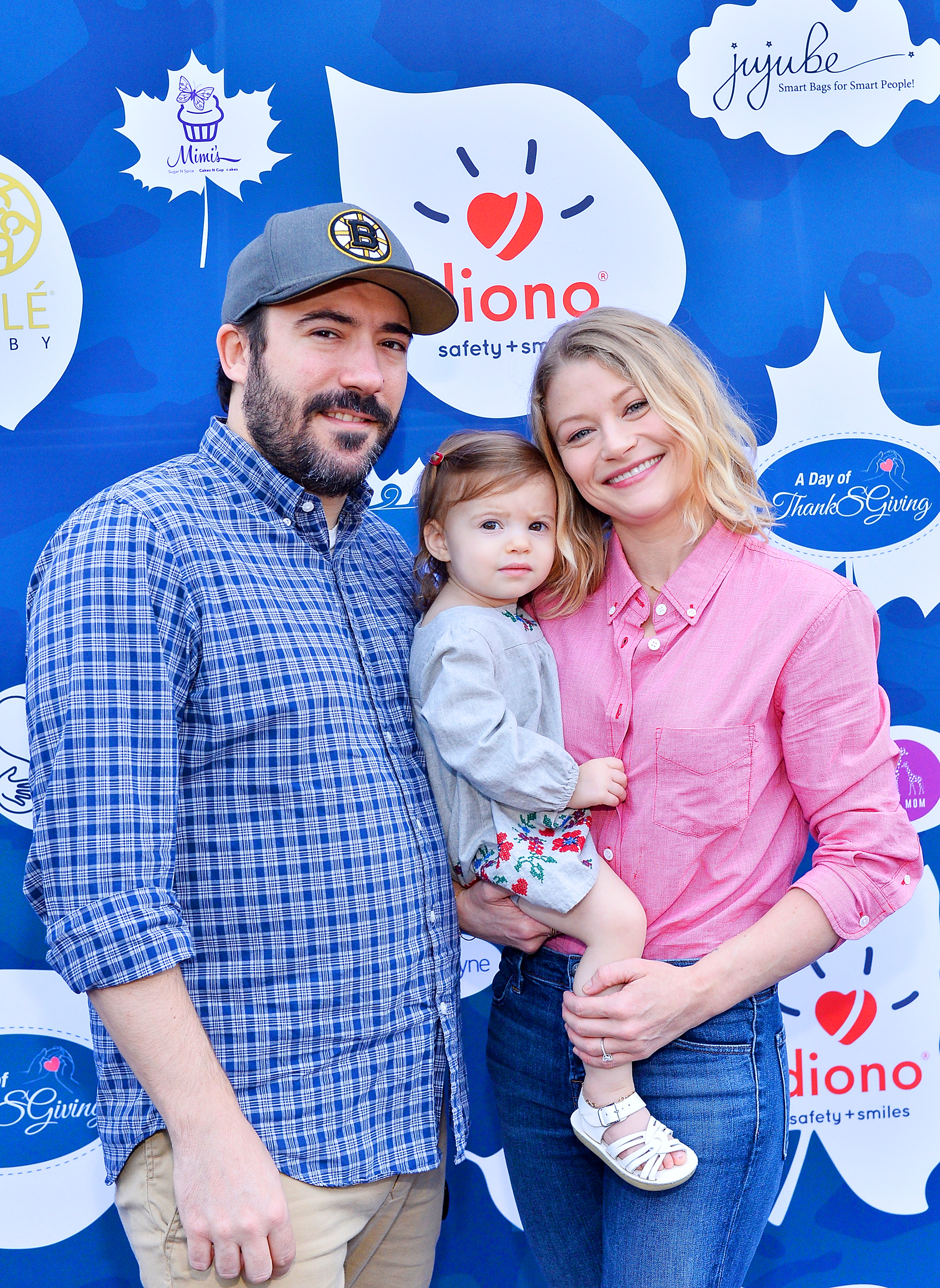 Emilie de Ravin and family