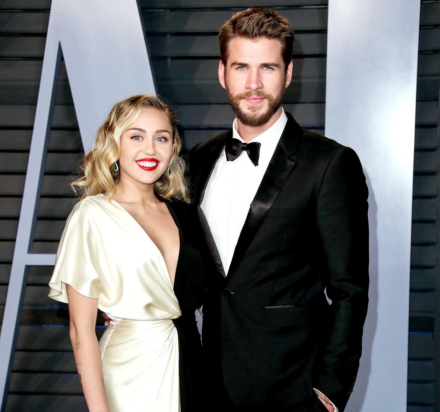 Miley-Cyrus-and-Liam-Hemsworth-bowling