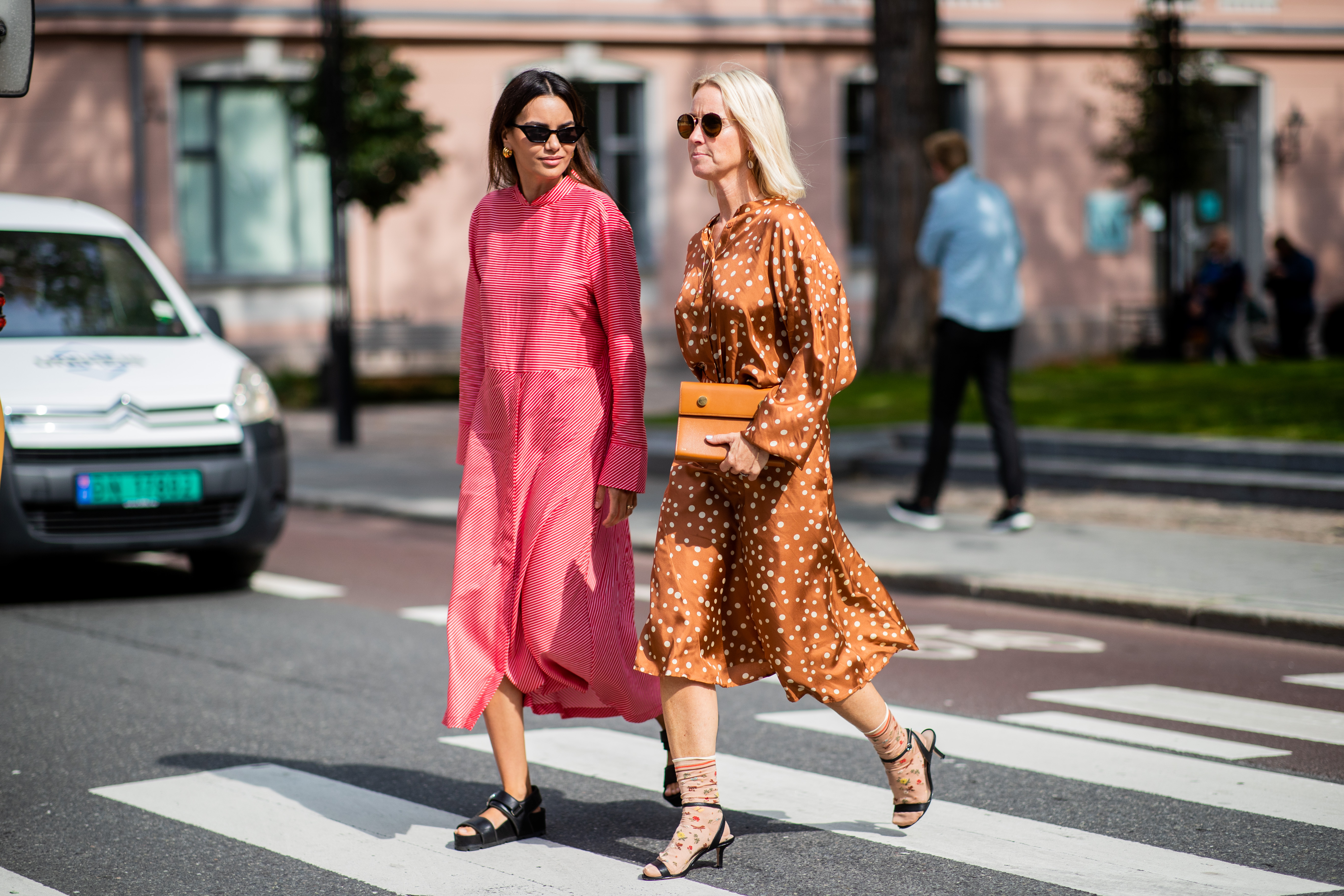 street style two women walking in the street