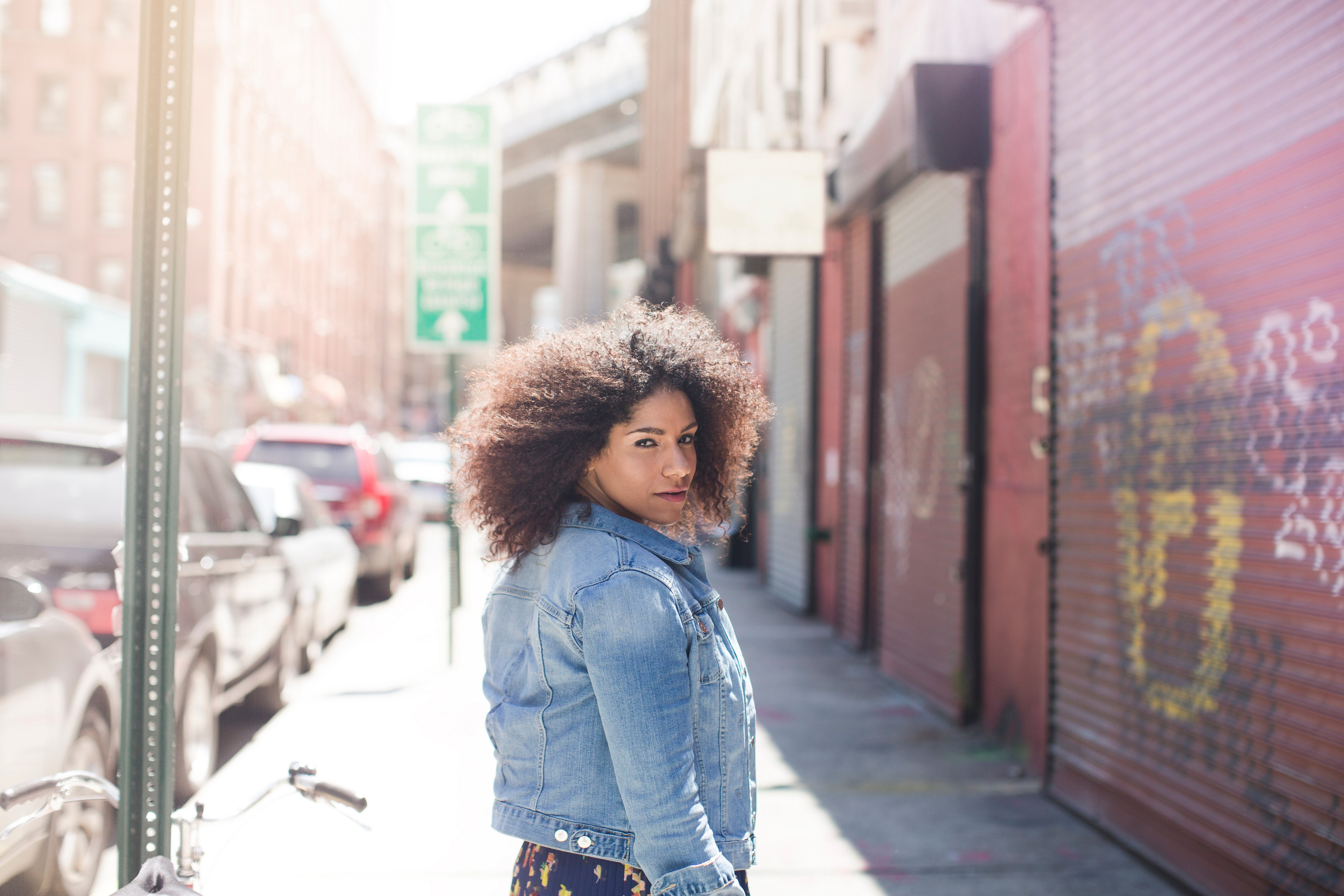 woman in denim jacket