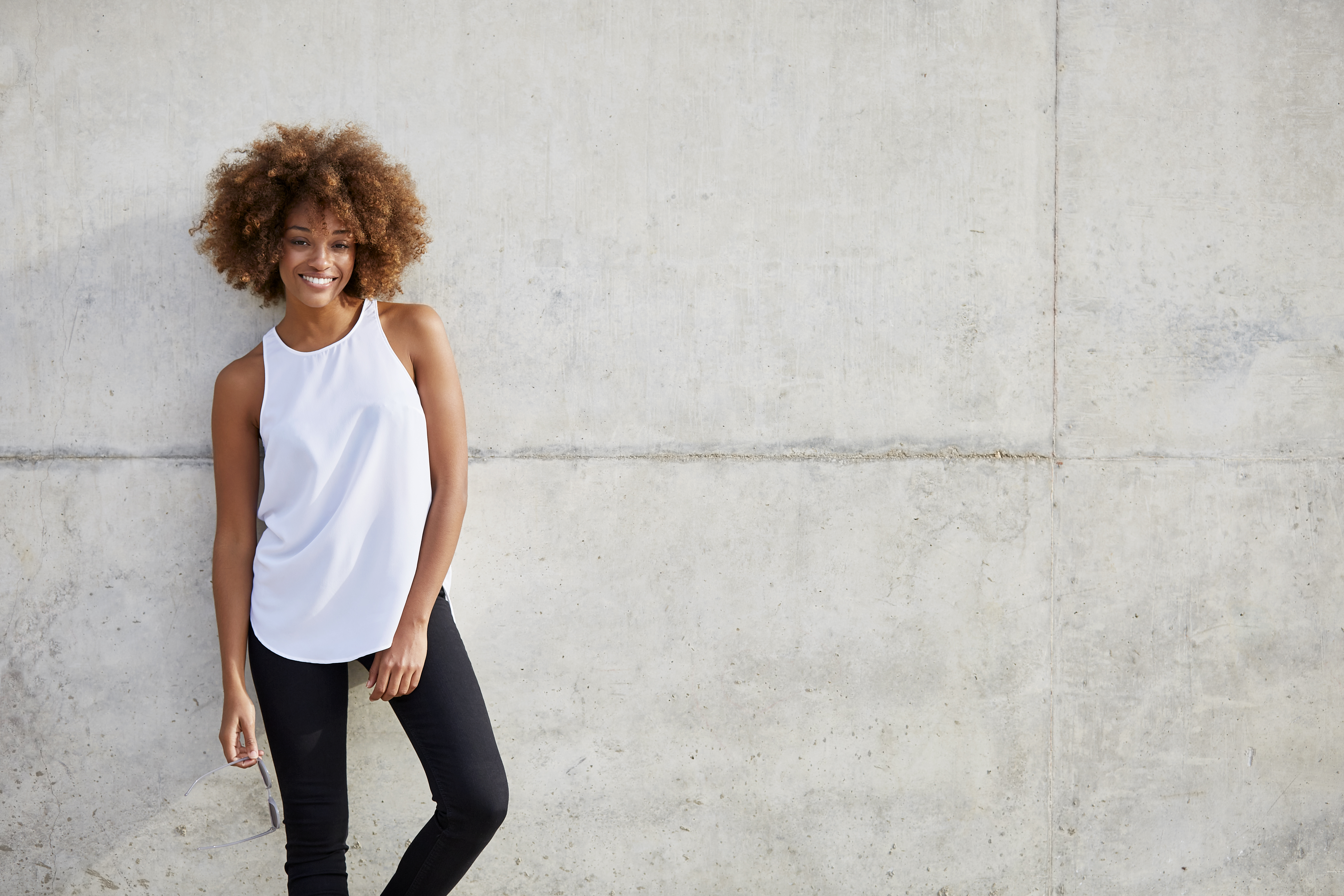 woman in white tank top
