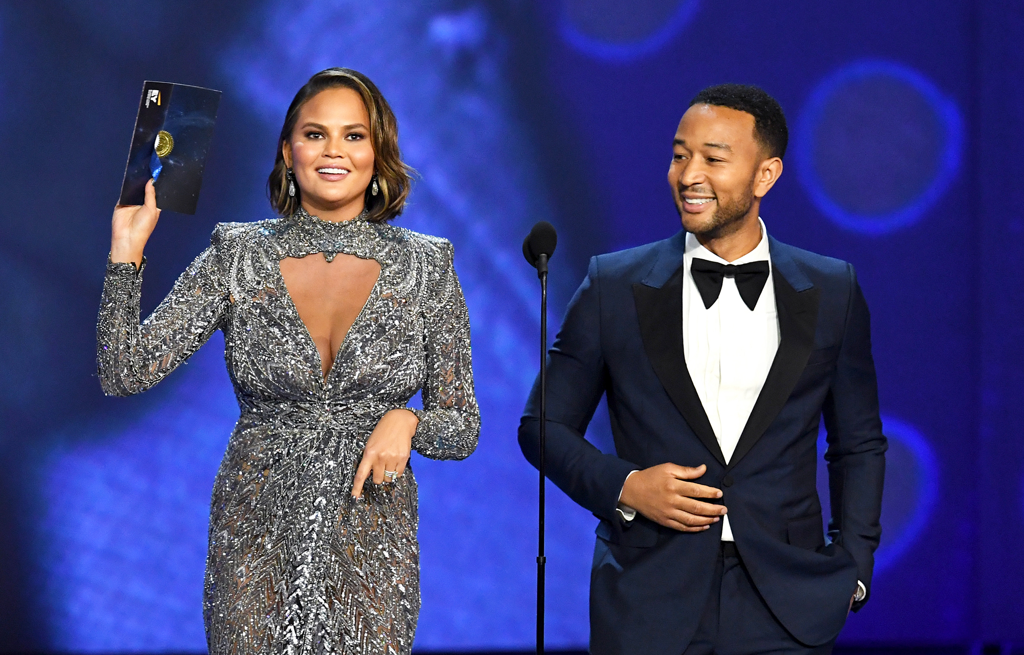 Chrissy Teigen Claps Back at Emmys Viewer Who Thinks She’s Pregnant
