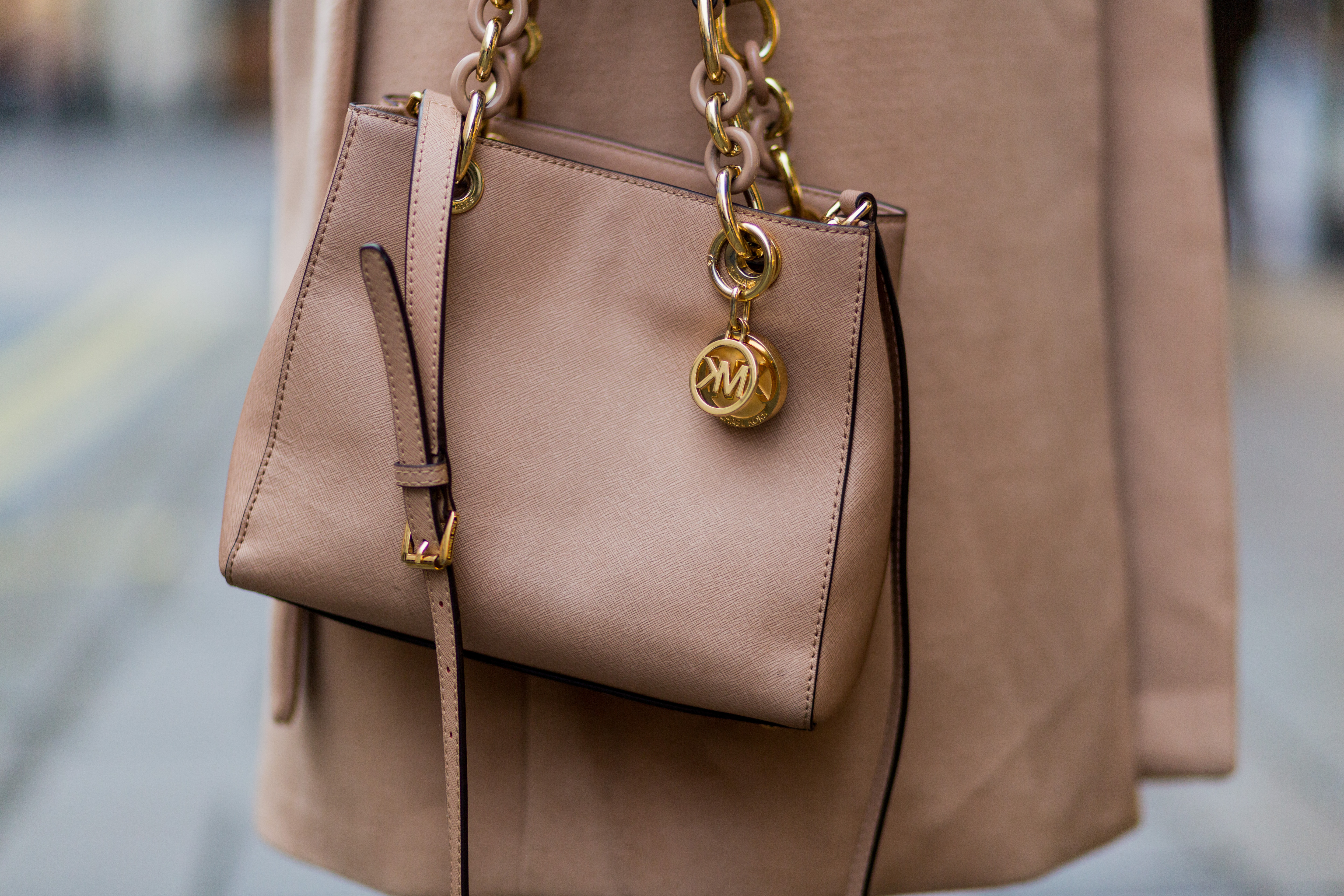 woman with michael kors bag