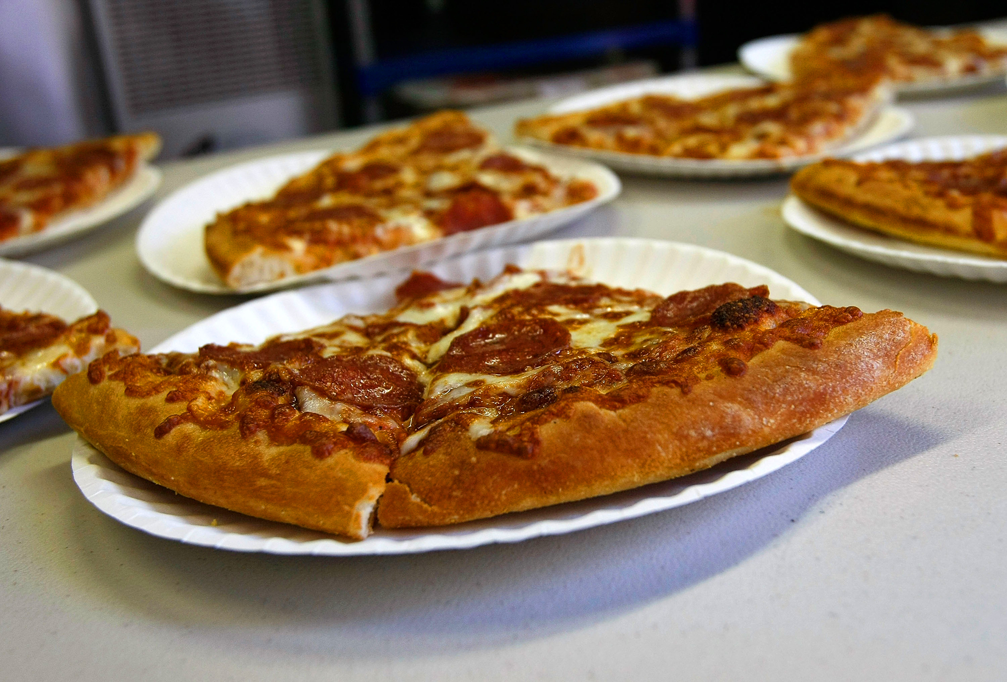 Slices of pizza made by the Little Caesars