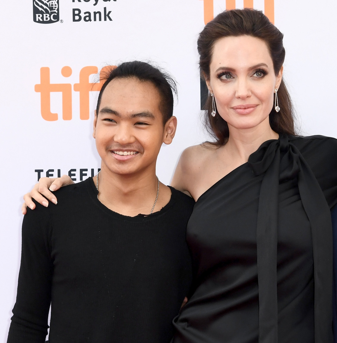 Maddox Jolie-Pitt and Angelina Jolie