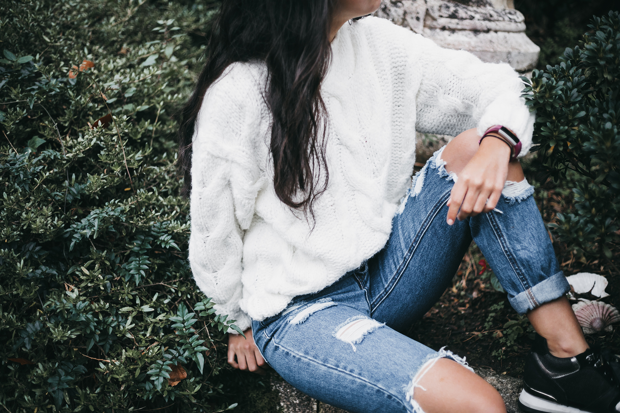 casual portrai t of teenager in ripped jeans