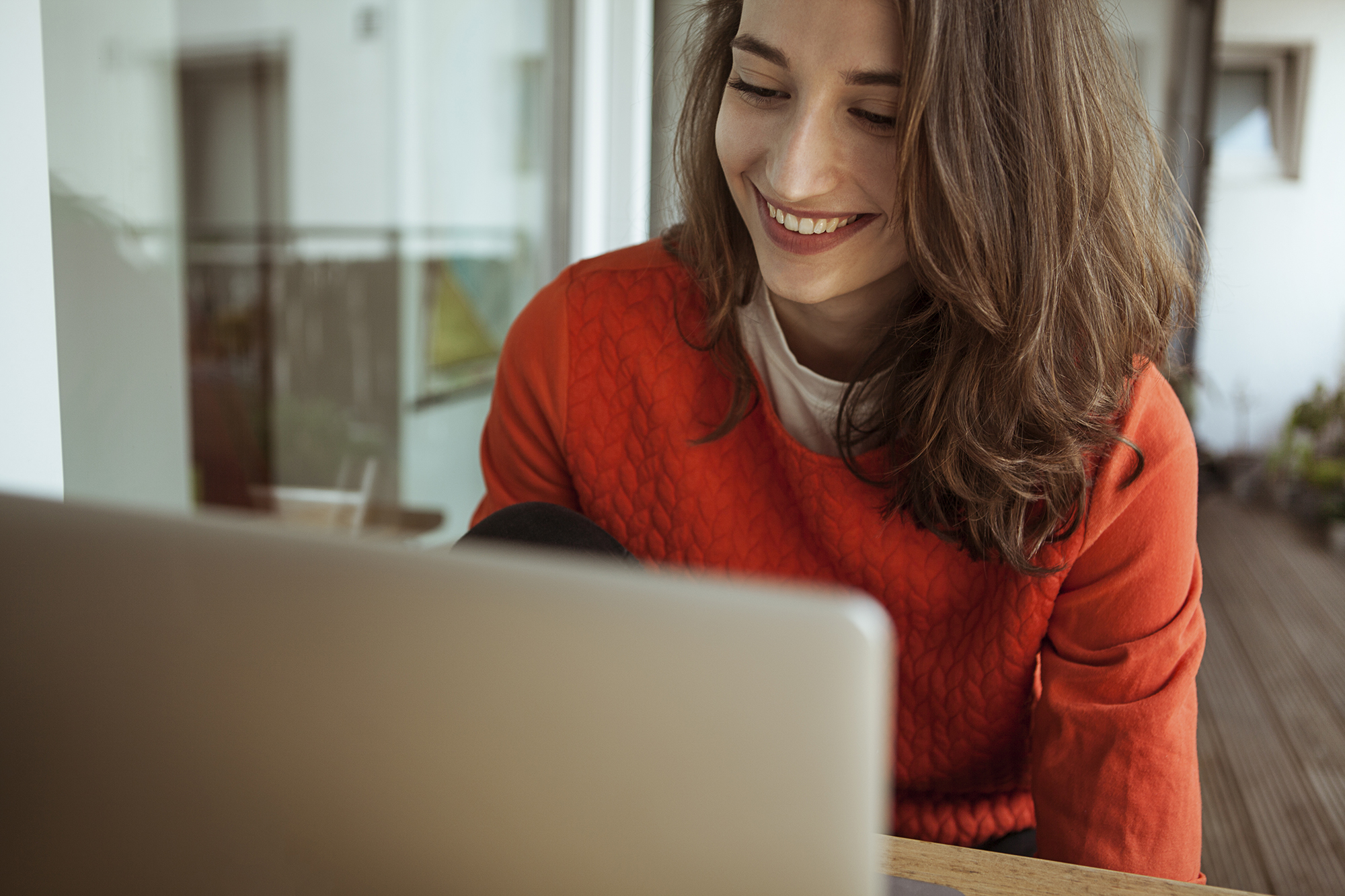 Woman Using Laptop