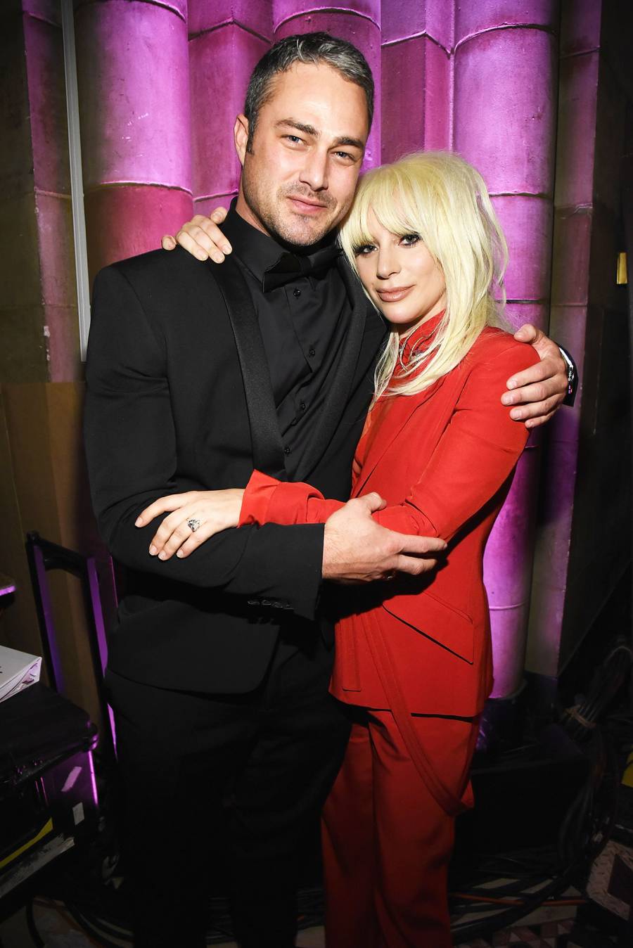 Taylor Kinney (L) and Lady Gaga