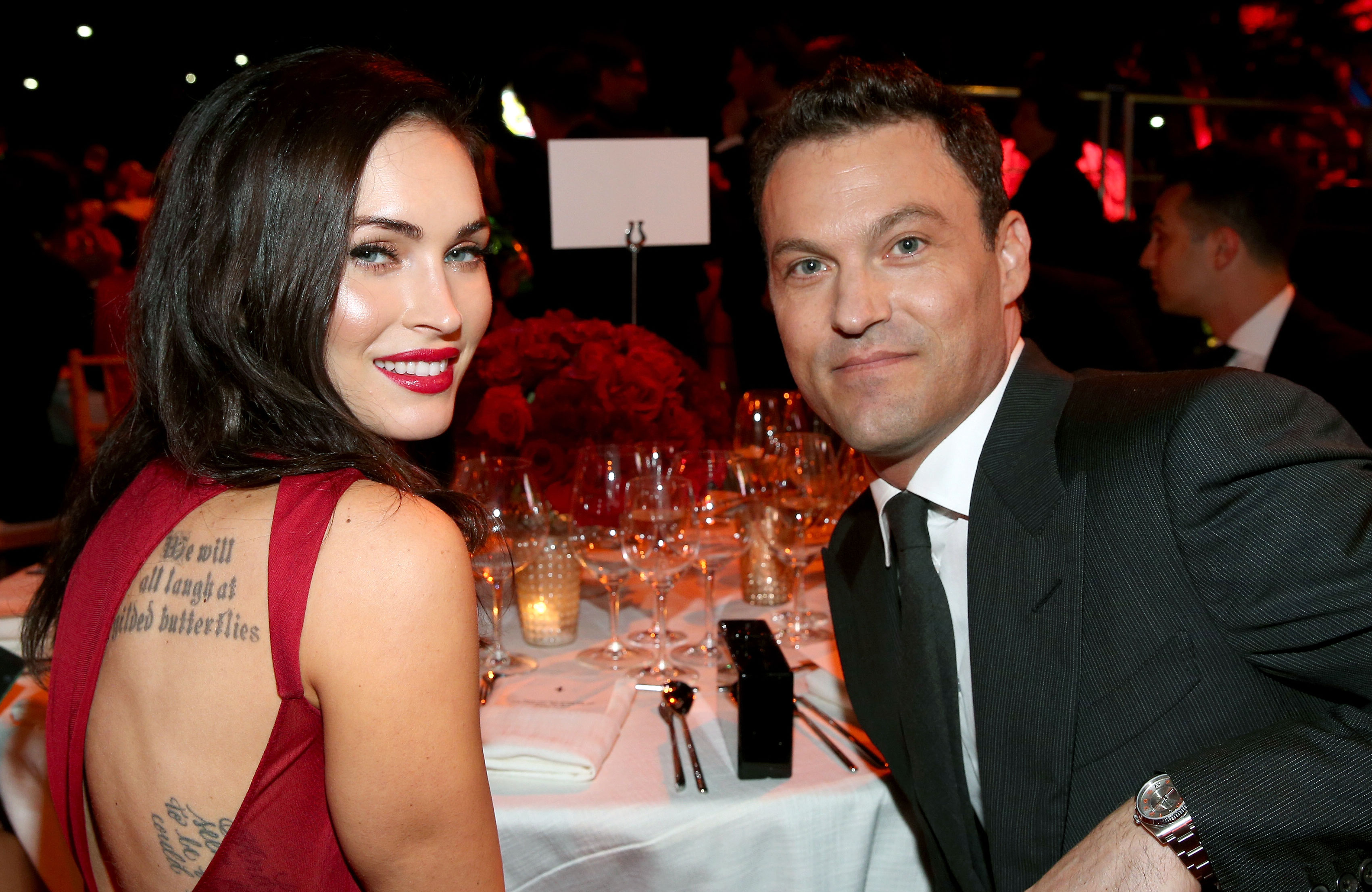 Megan Fox Reportedly Files to Dismiss Brian Austin Green Divorce Red Dress Gray suit Ferrari Celebrates 60 Years In America