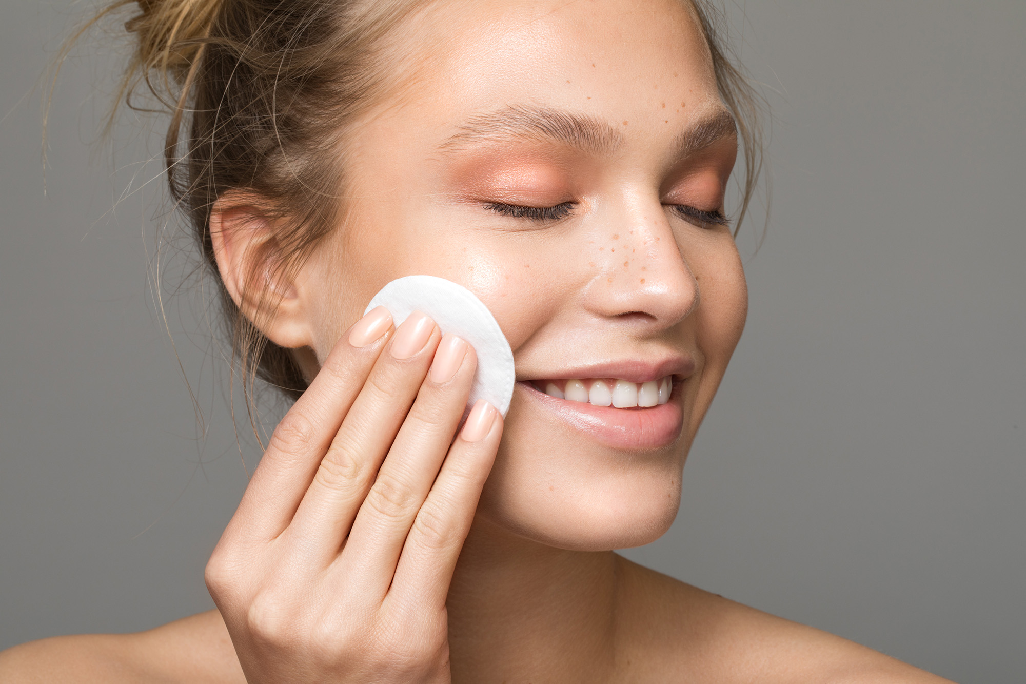Woman Using Cotton Pad