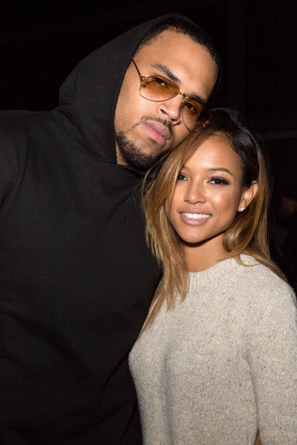 Chris Brown Wearing Glasses Goate Black Hoodie And Karrueche Tran