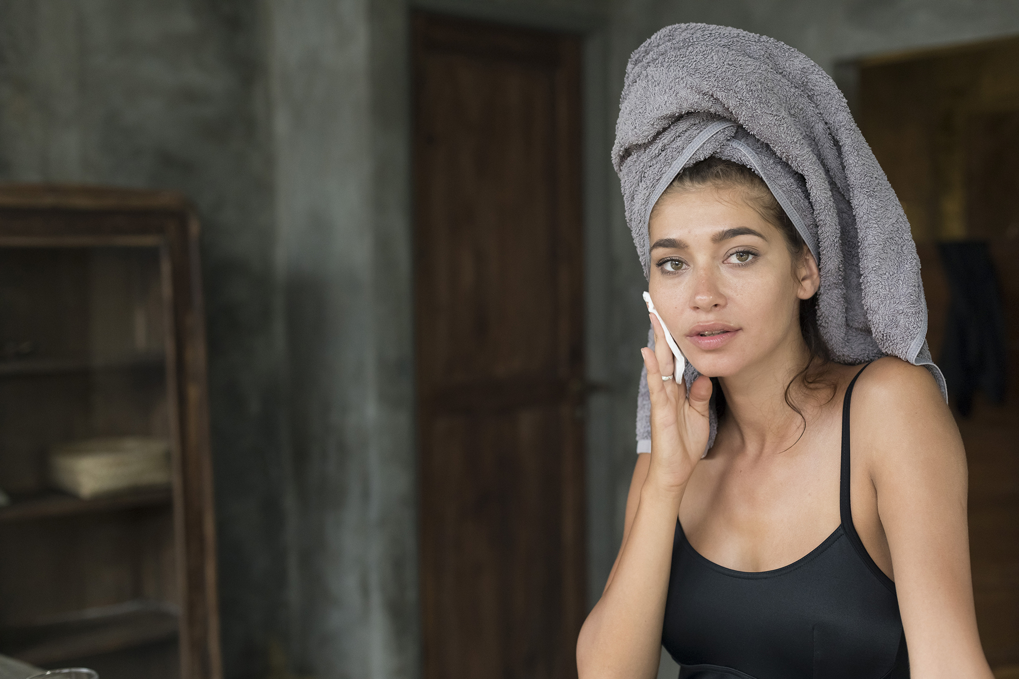 Woman Using Cotton Pad
