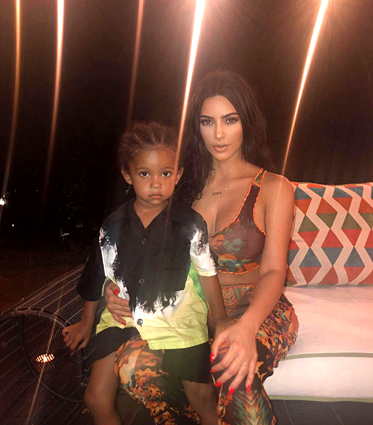 Saint West Photo Album Kim Kardashian Cheek Eat Them