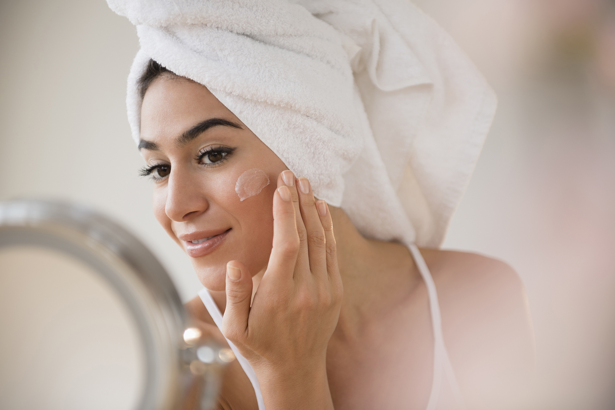 Woman applying cream