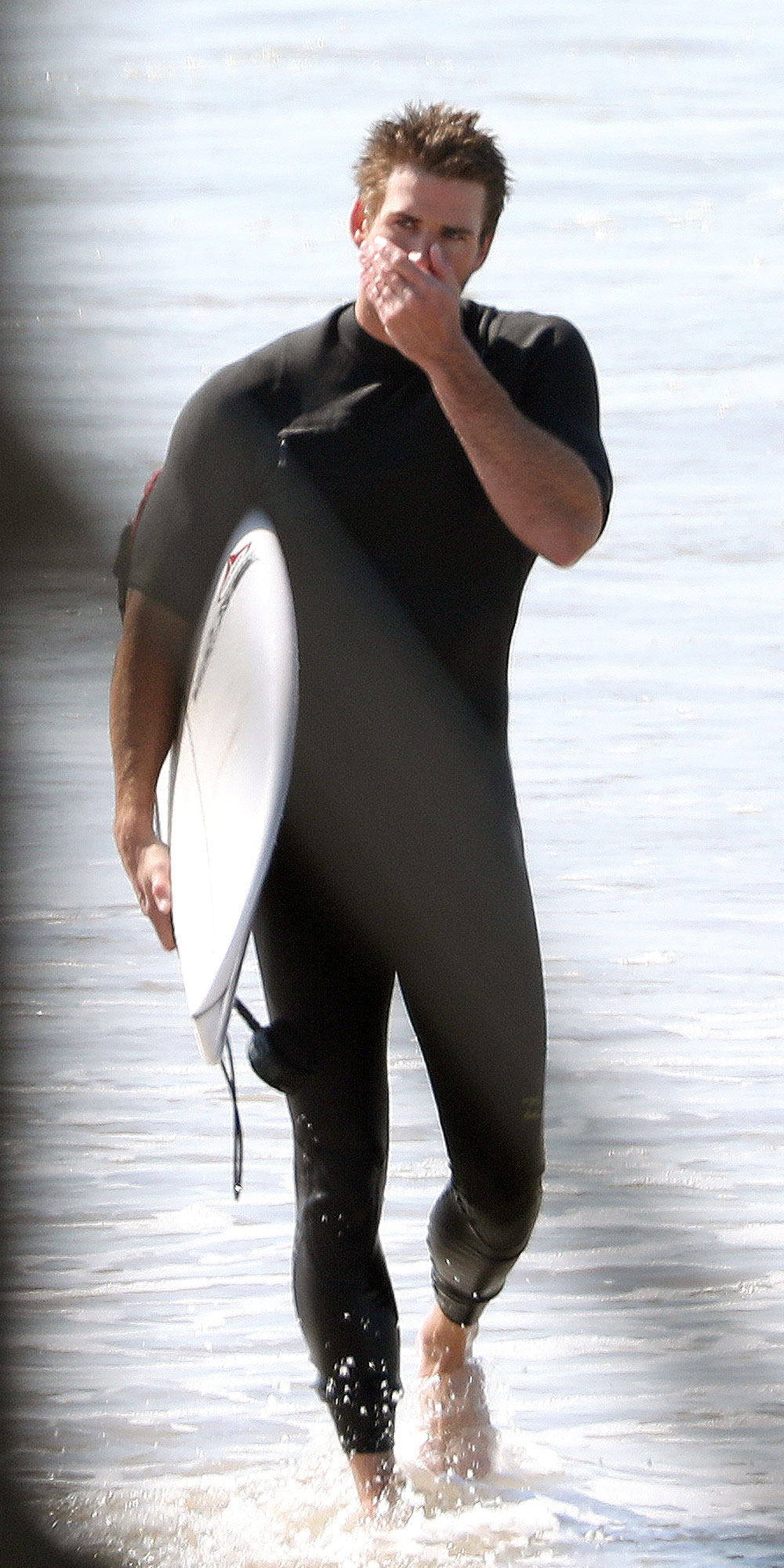 Liam Hemsworth Goes Surfing With Brother Chris After Miley Cyrus Split