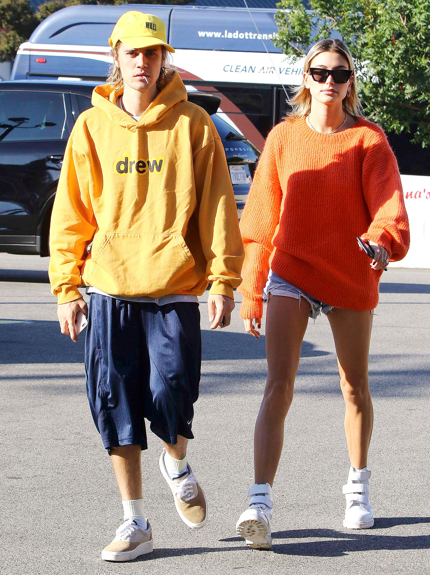 Justin Bieber and Hailey Baldwin Thanks Parents Yellow Hoodie Drew Orange Sweater