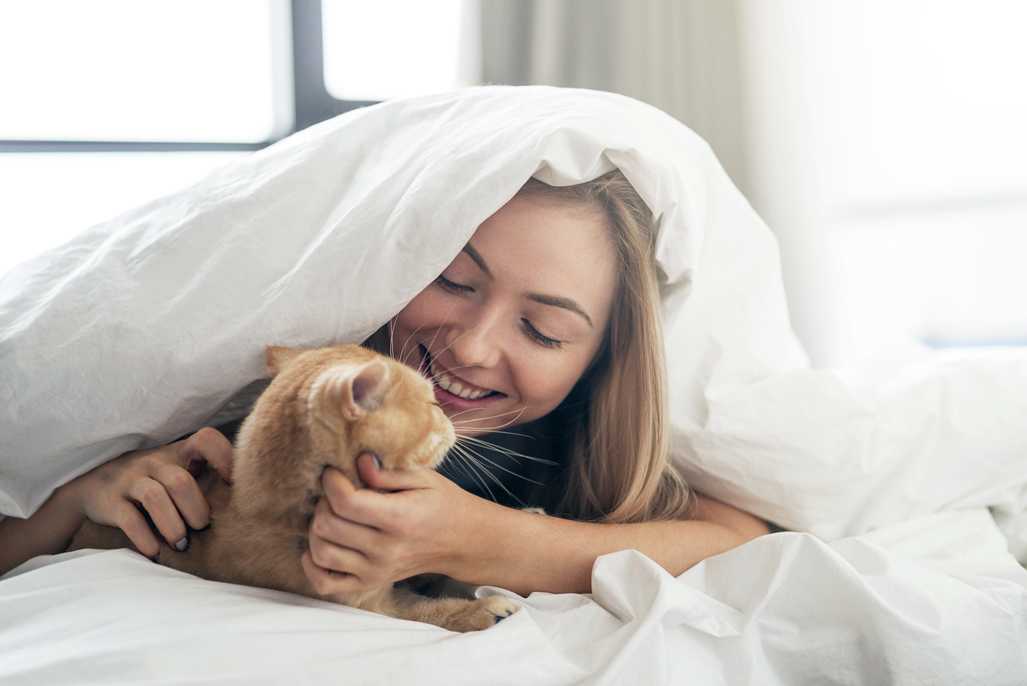 woman under blanket