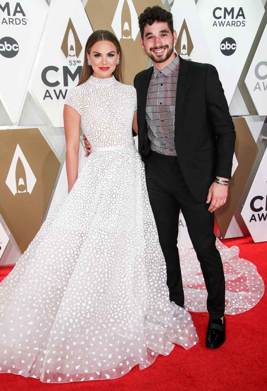 Hannah Brown and Alan Bersten 2019 CMA Awards Arrival Red Carpet White Dress