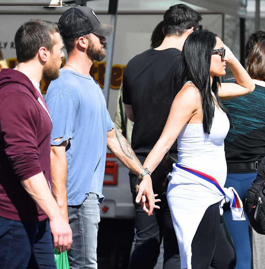 Nikki Bella Kisses Fiance Artem Chigvintsev While Showing Off Baby Bump