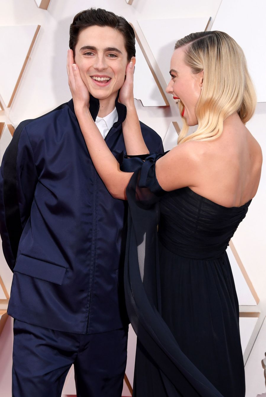 Timothee Chalamet Photobombs Margot Robbie Oscars Red Carpet