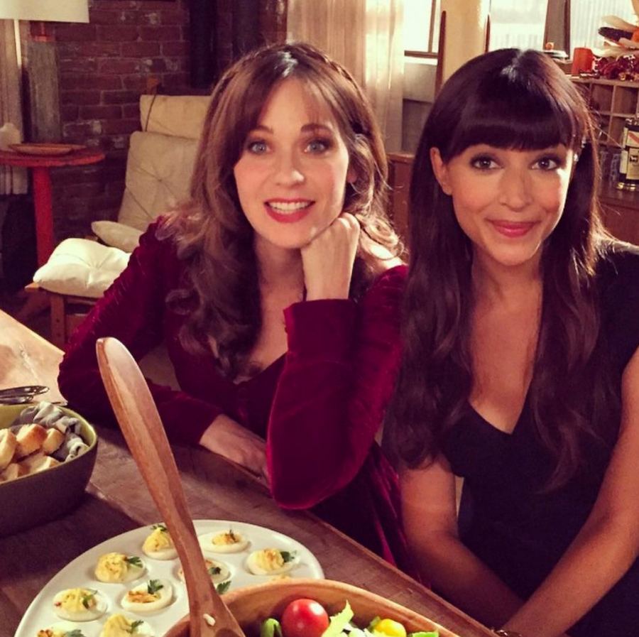 Zooey-Deschanel-and-Hannah-Simone-snacking-on-set