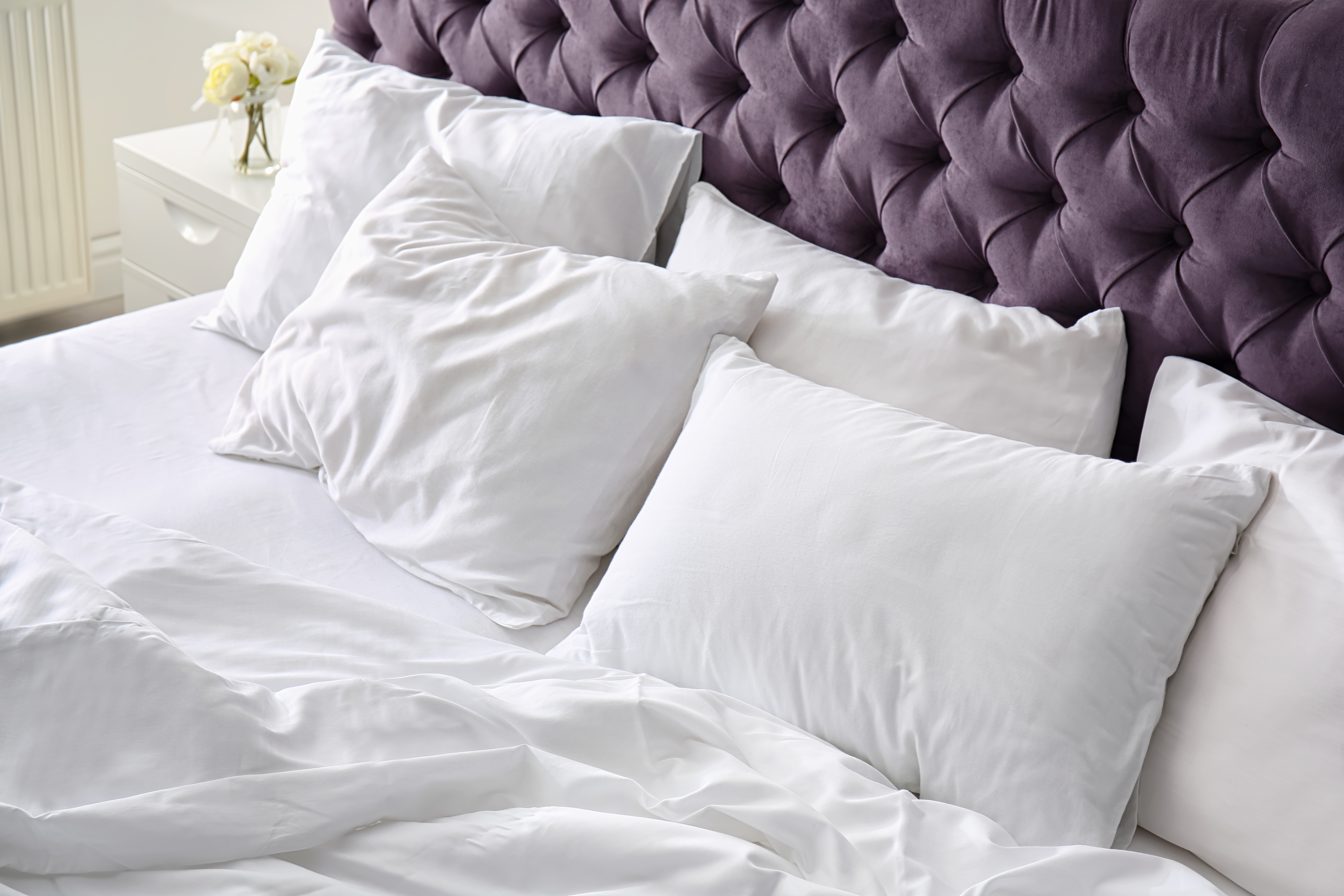 Bed with pillows and comforter