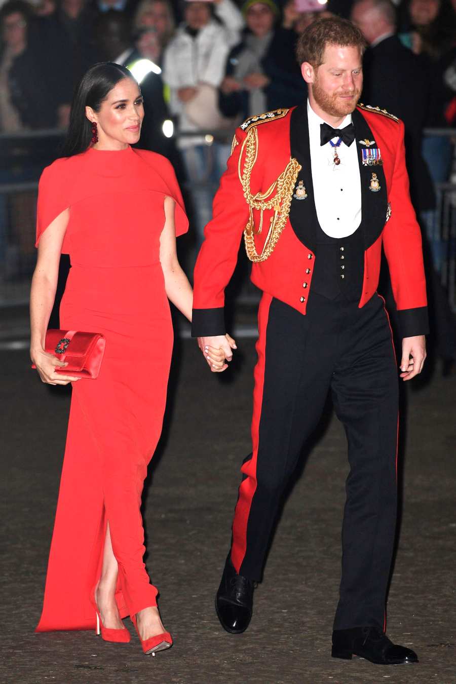 Prince Harry and Duchess Meghan Hold Hands in Matching Red at Festival of Music