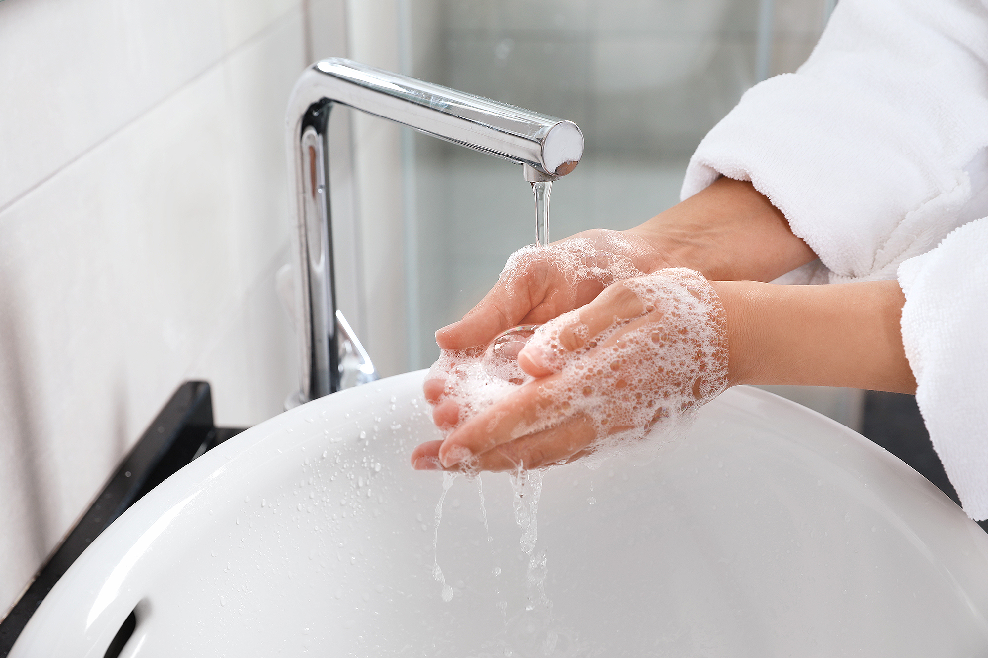 person-washing-hands