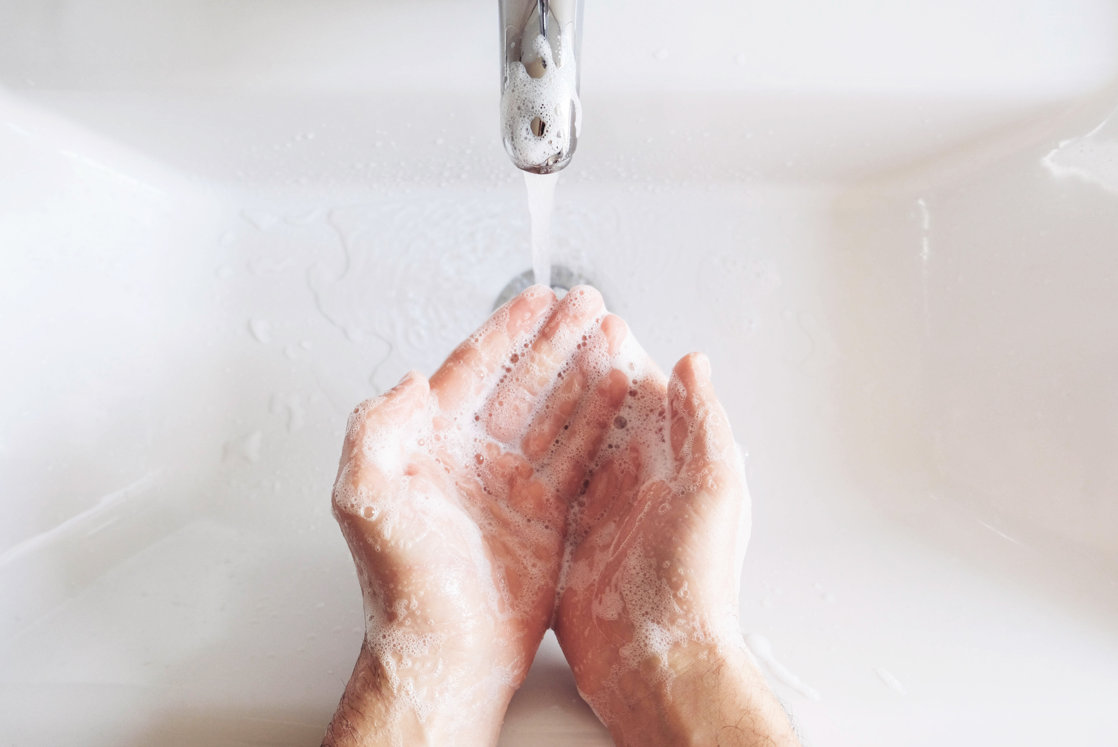 washing hands with soap