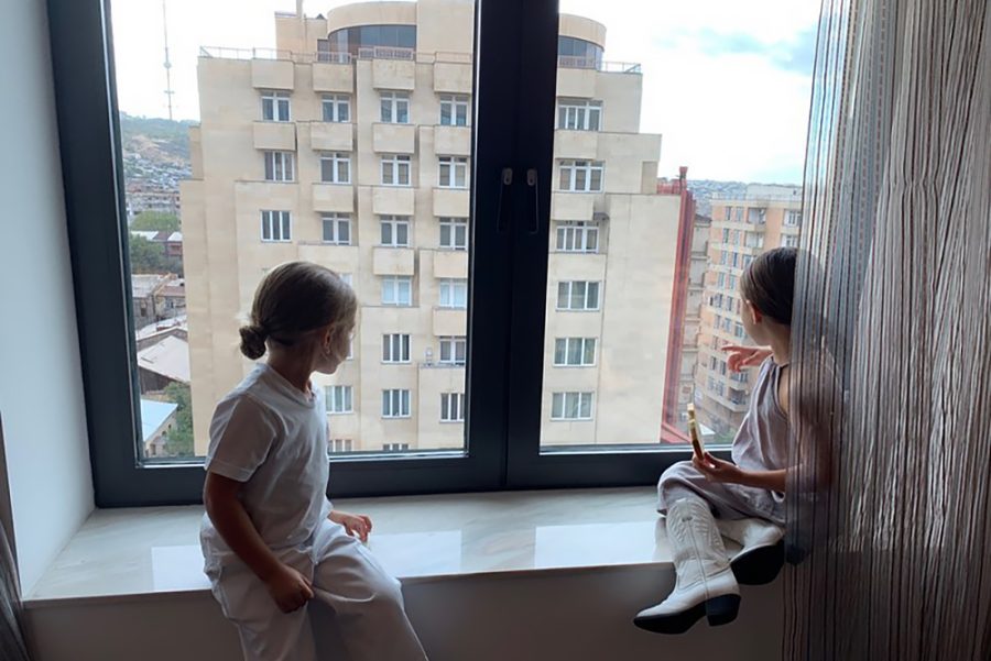 Penelope and Reign looked out a window while traveling in Armenia